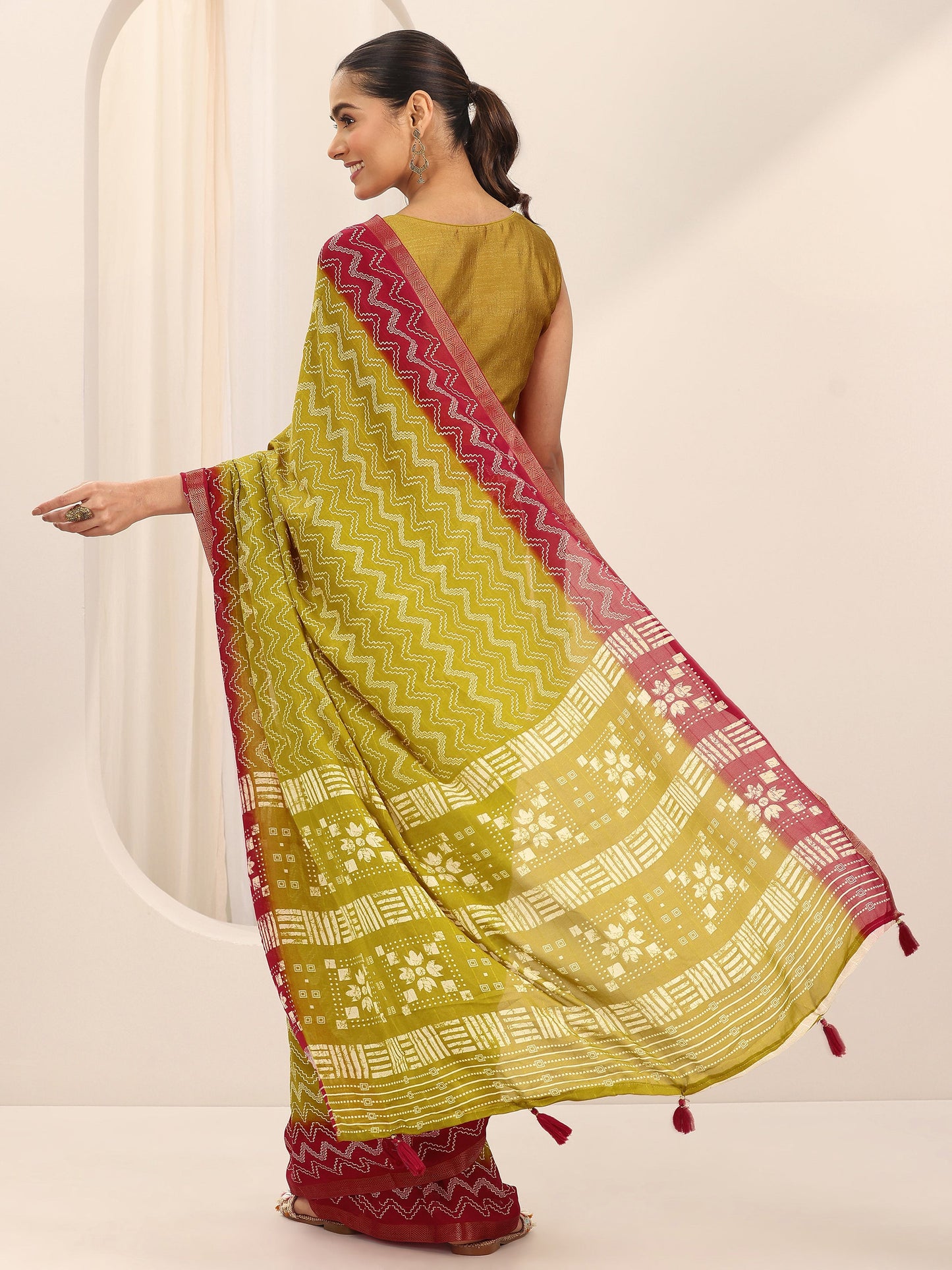 Mustard Printed Georgette Saree With Unstitched Blouse Piece