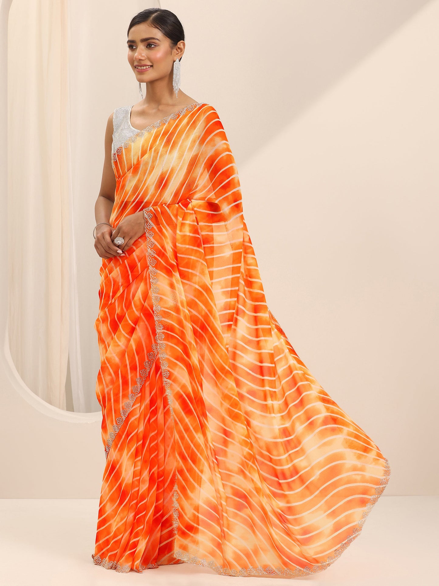 Orange Leheriya Printed Georgette Saree With Unstitched Blouse Piece