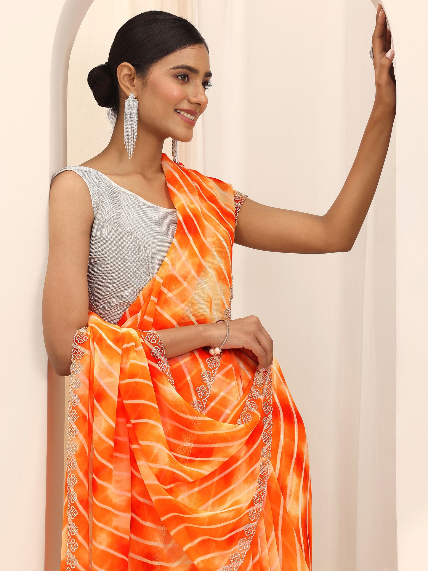 Orange Leheriya Printed Georgette Saree With Unstitched Blouse Piece