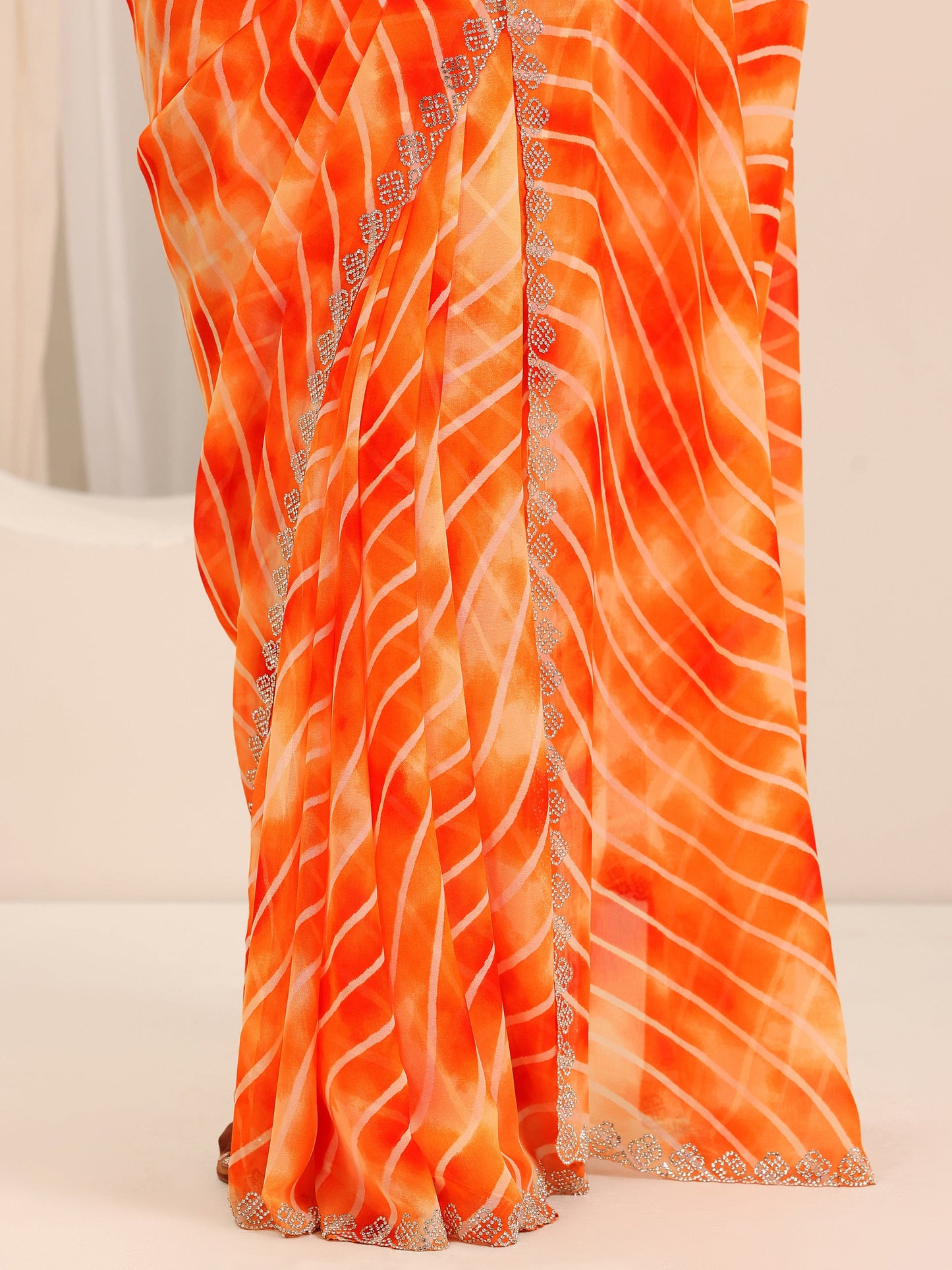 Orange Leheriya Printed Georgette Saree With Unstitched Blouse Piece