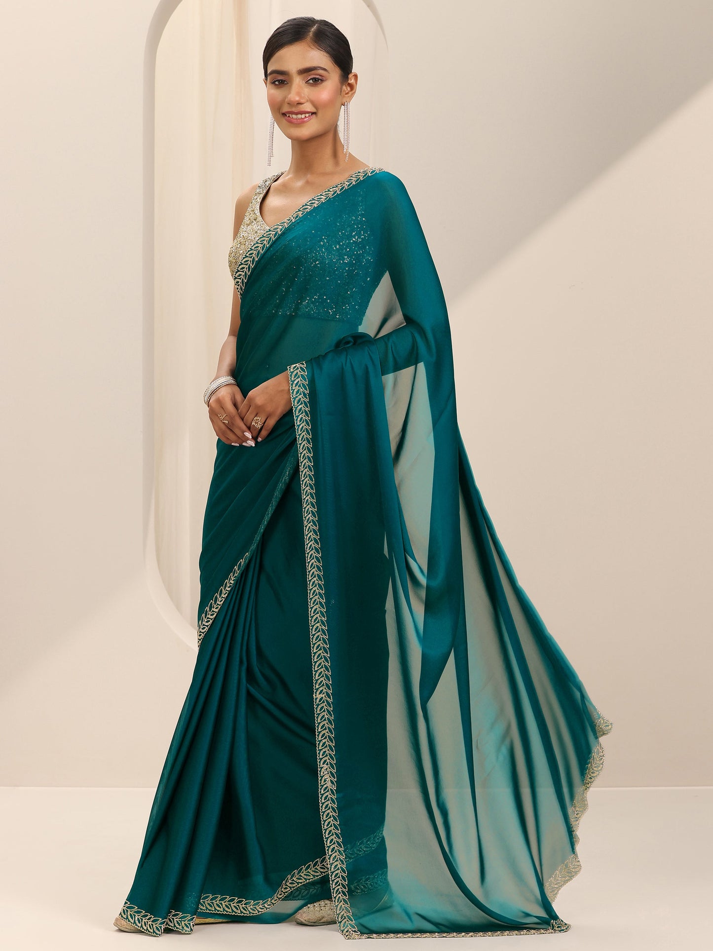 Teal Solid Jimmy Choo Satin Saree With Unstitched Blouse Piece