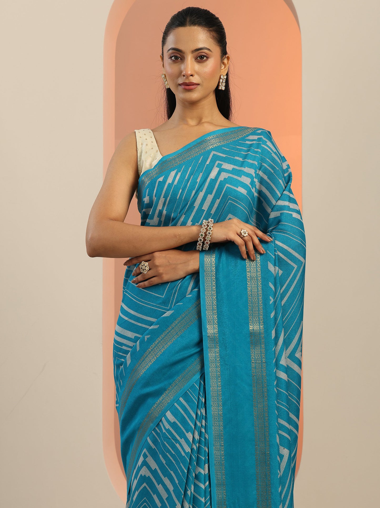 Teal Printed Georgette Saree With Unstitched Blouse Piece
