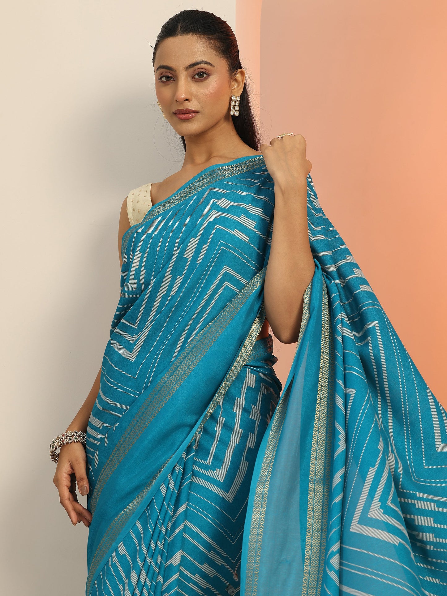 Teal Printed Georgette Saree With Unstitched Blouse Piece