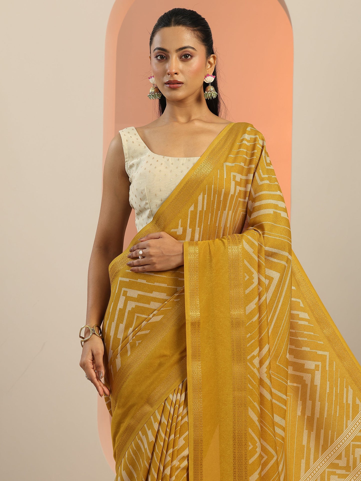 Mustard Printed Georgette Saree With Unstitched Blouse Piece
