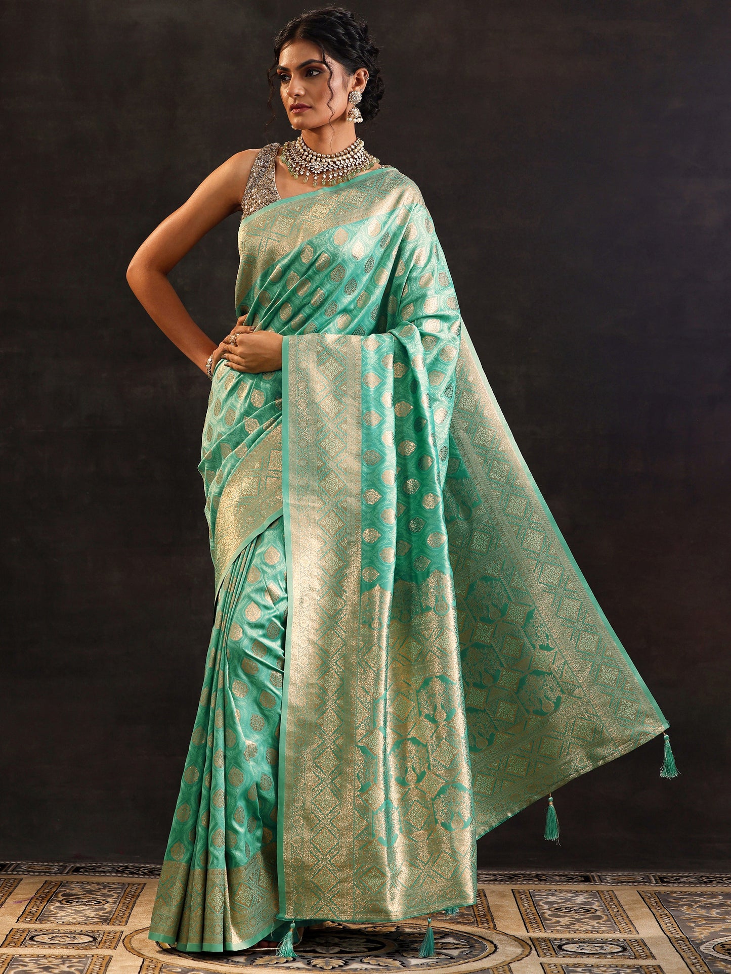 Sea Green Woven Design Silk Blend Saree With Unstitched Blouse Piece