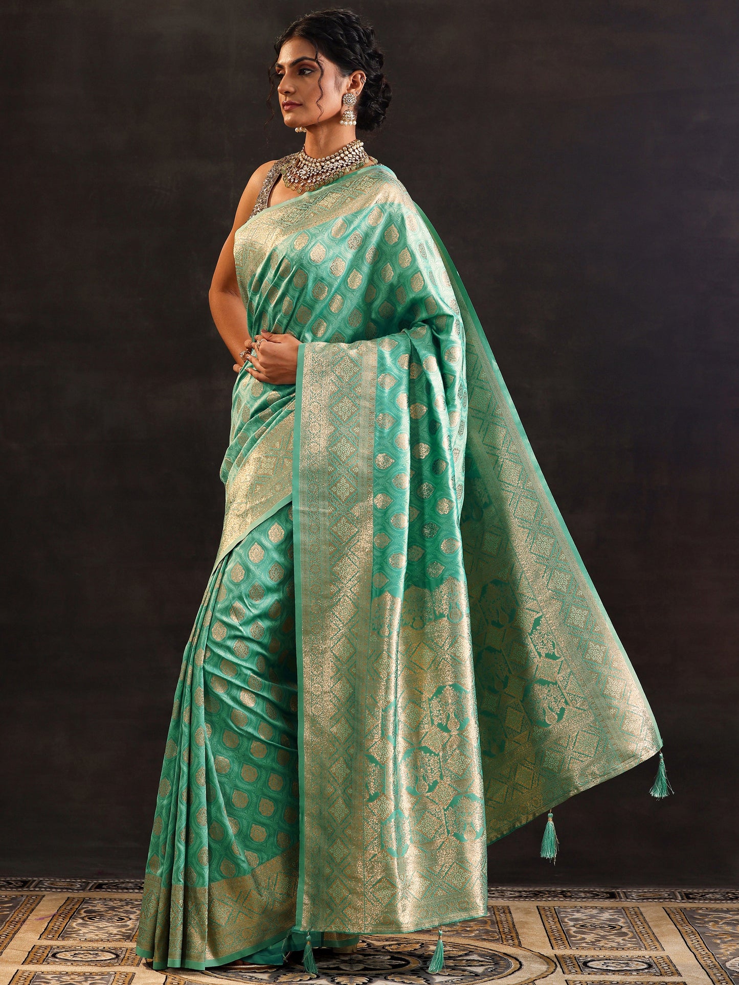 Sea Green Woven Design Silk Blend Saree With Unstitched Blouse Piece