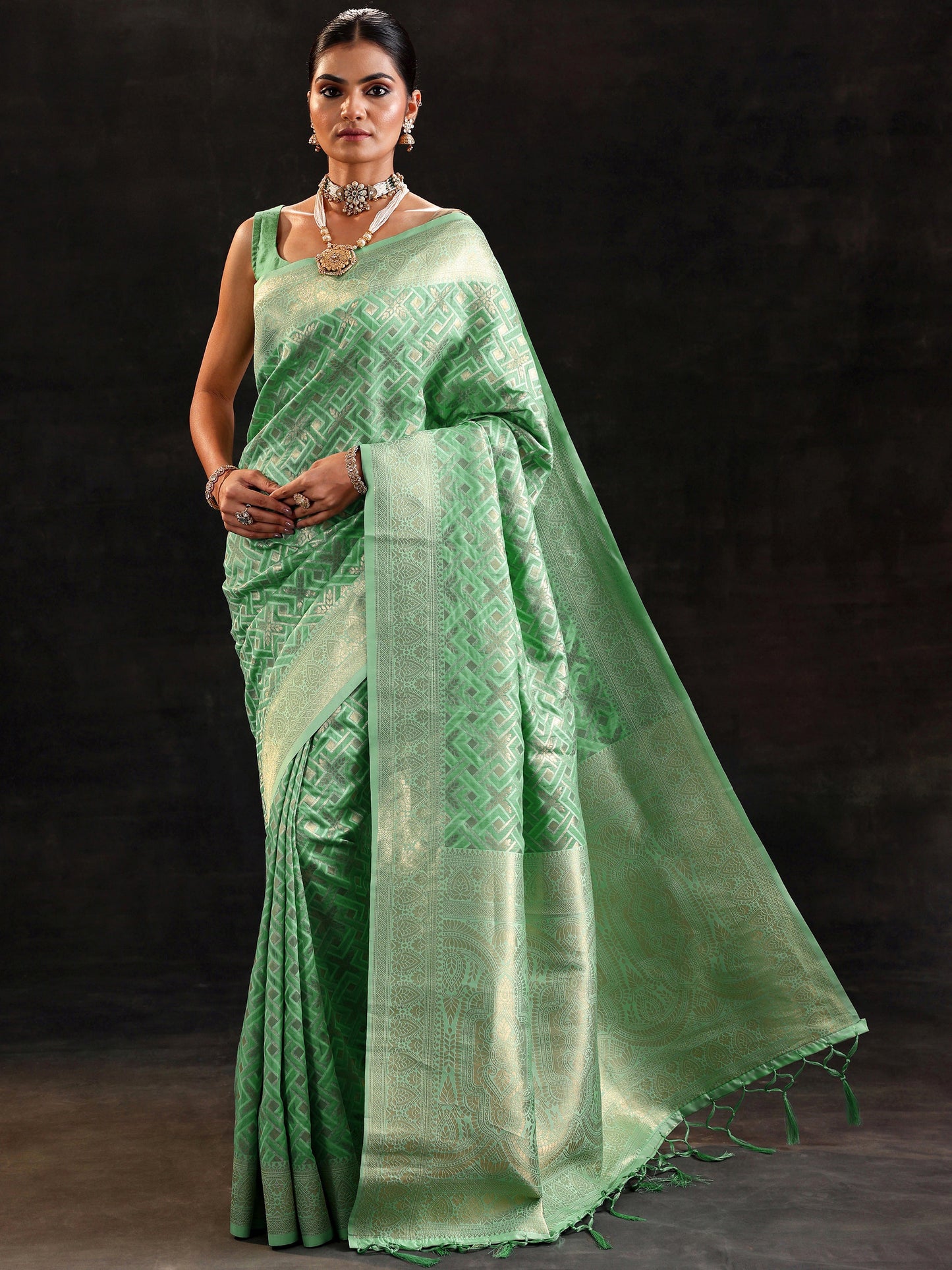 Sea Green Woven Design Silk Blend Saree With Unstitched Blouse Piece