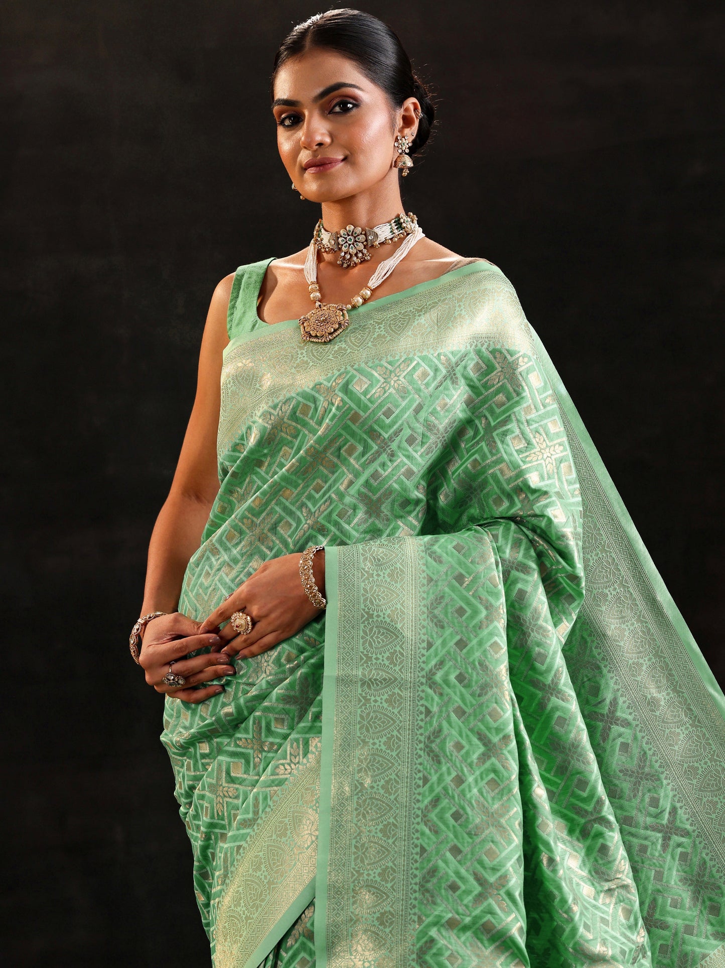 Sea Green Woven Design Silk Blend Saree With Unstitched Blouse Piece