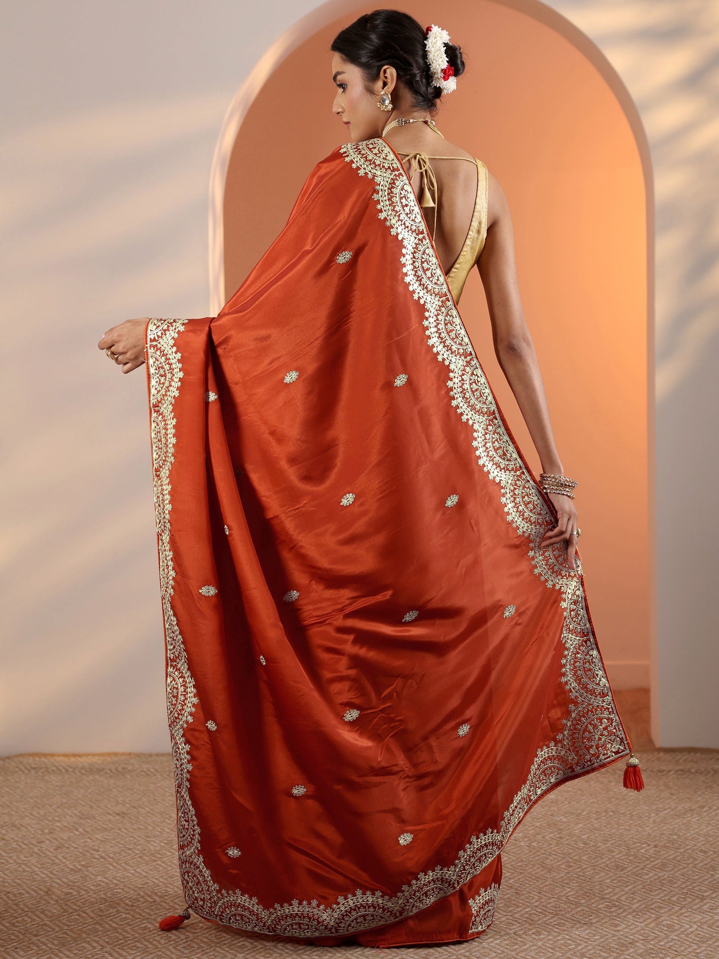Rust Embellished Crepe Saree With Unstitched Blouse Piece