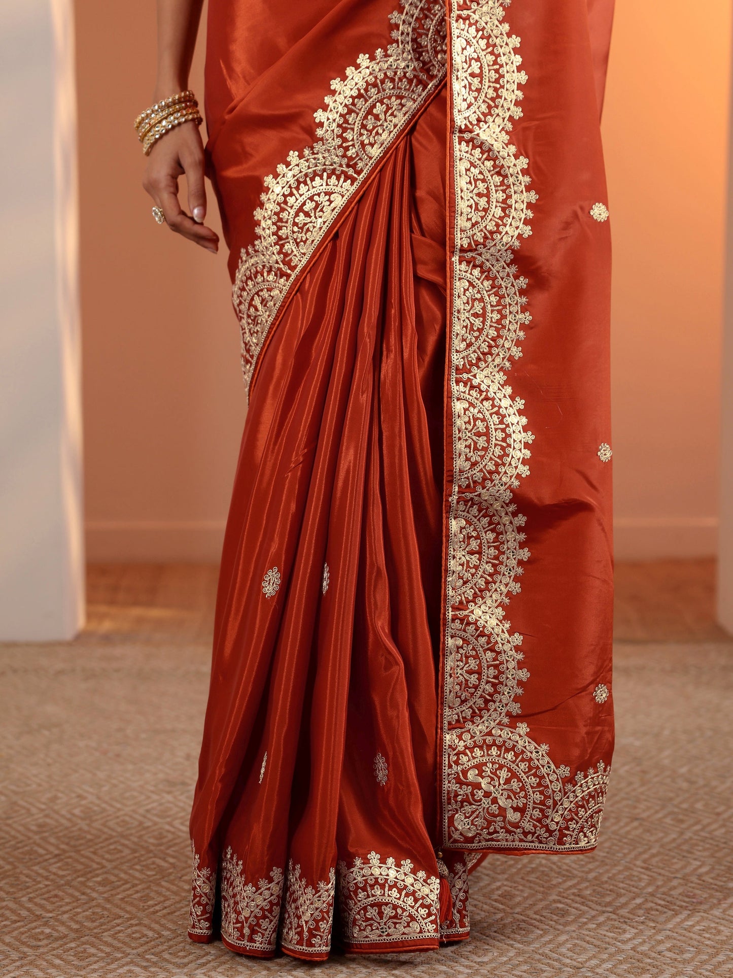 Rust Embellished Crepe Saree With Unstitched Blouse Piece