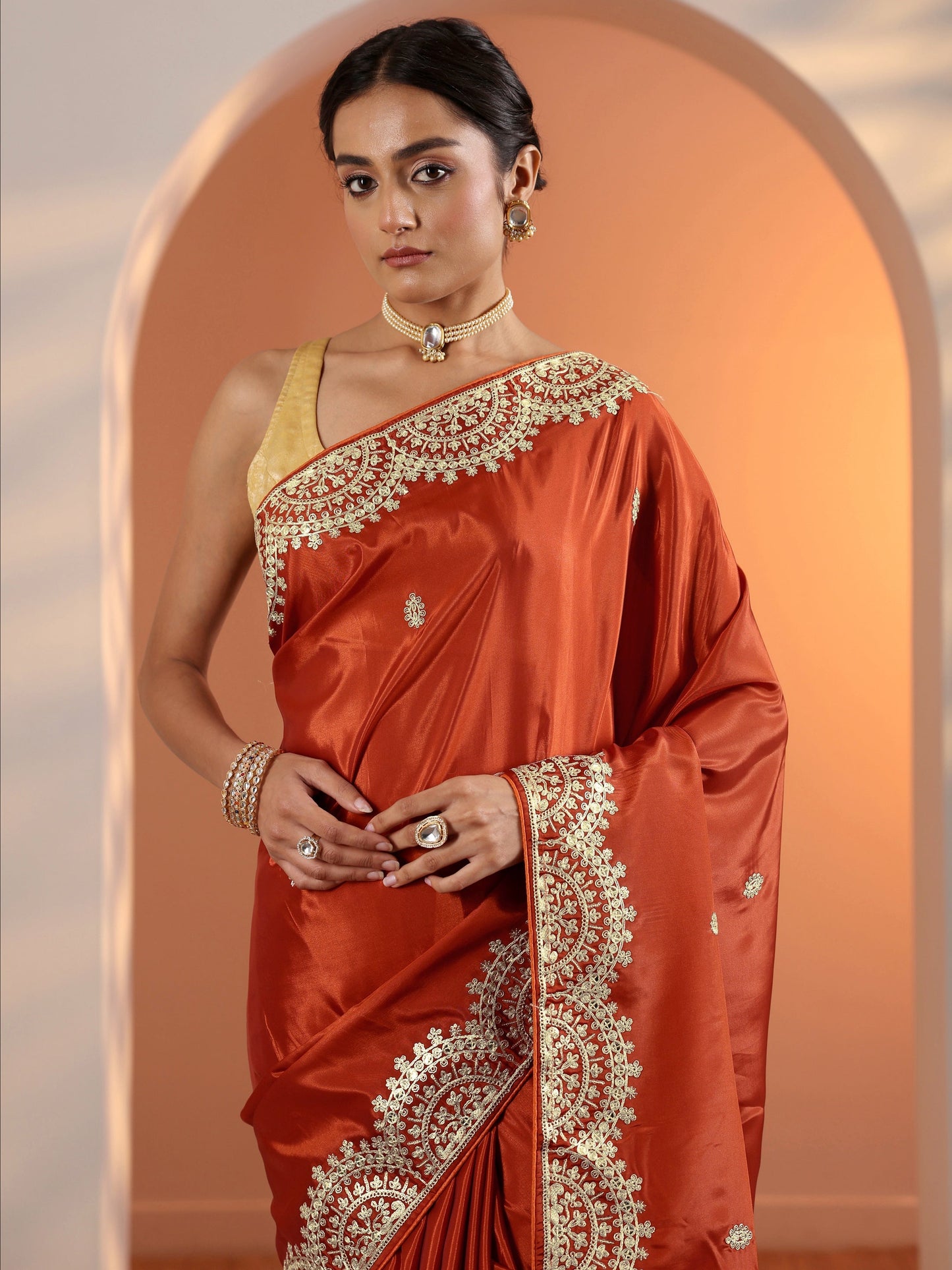 Rust Embellished Crepe Saree With Unstitched Blouse Piece
