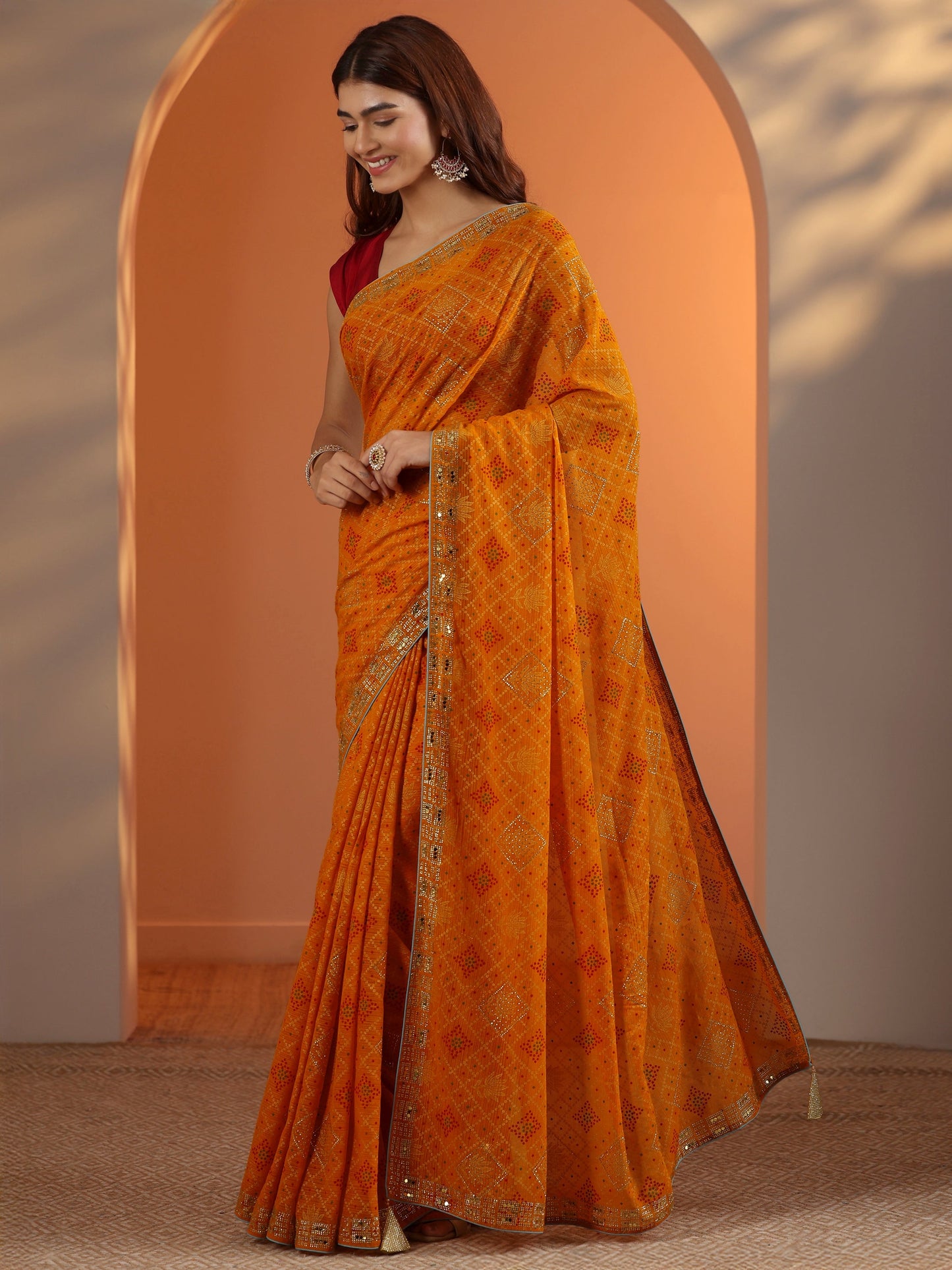 Mustard Printed Georgette Saree With Unstitched Blouse Piece