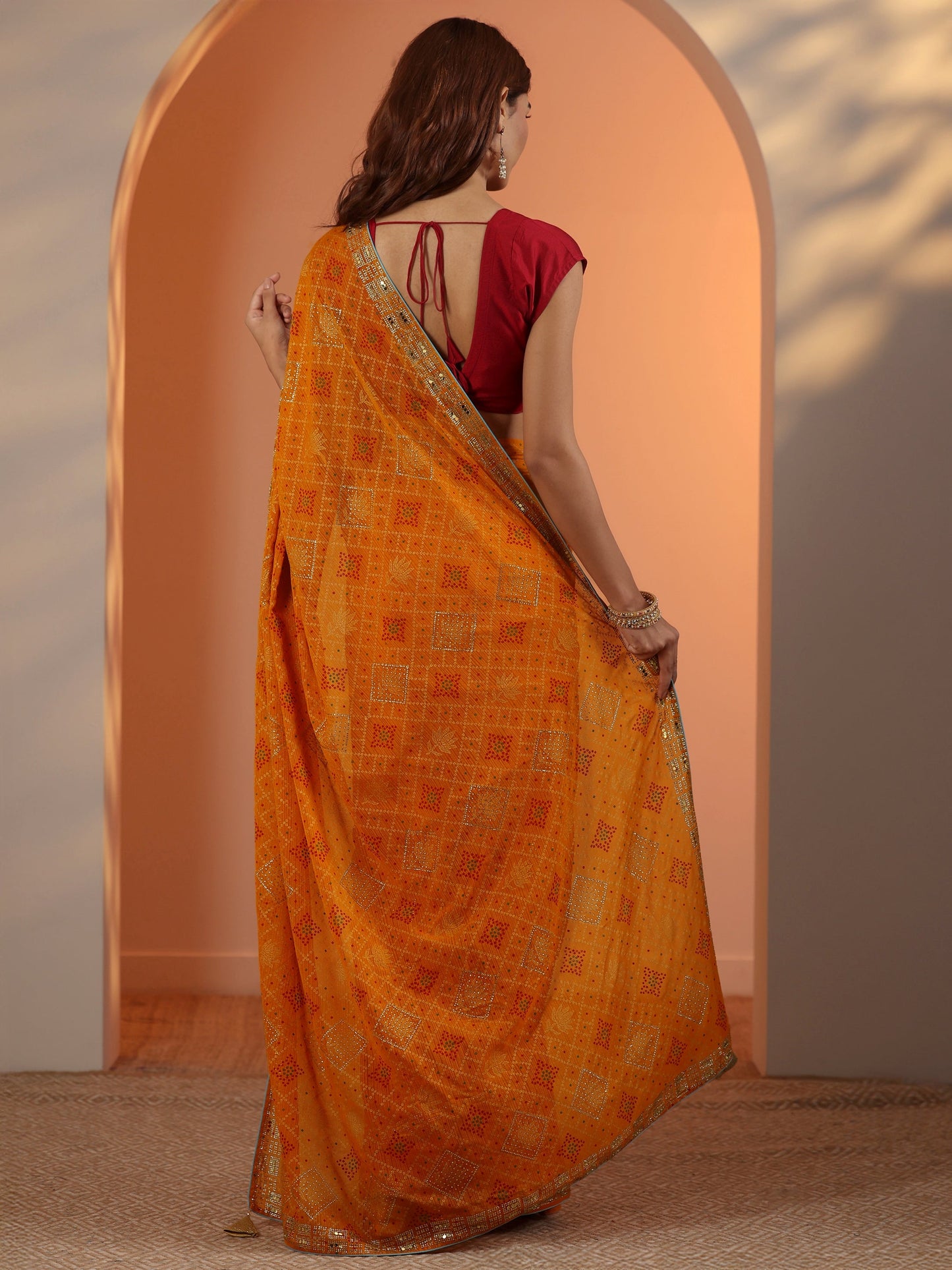 Mustard Printed Georgette Saree With Unstitched Blouse Piece