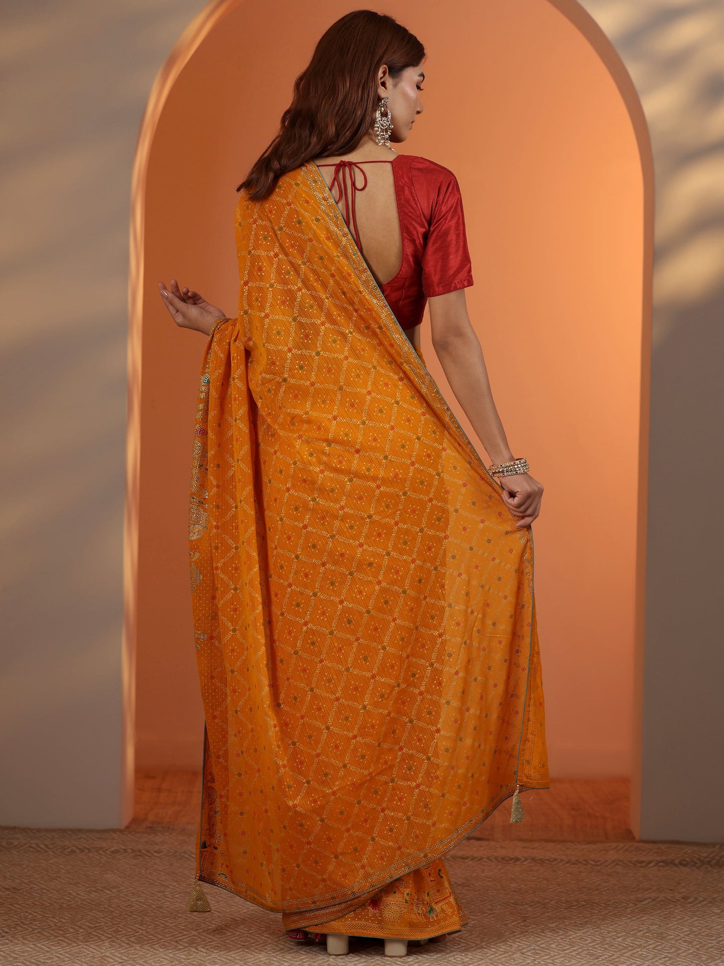 Mustard Printed Georgette Saree With Unstitched Blouse Piece