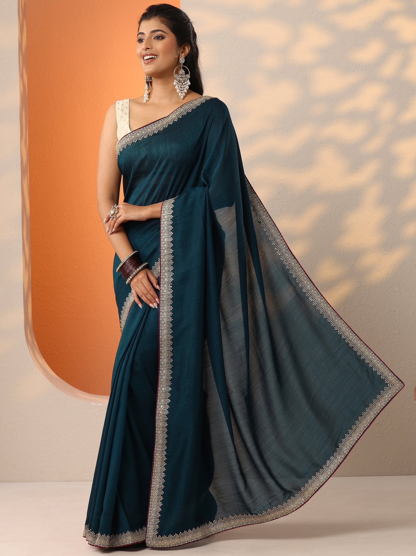 Teal Solid Silk Blend Saree With Unstitched Blouse Piece