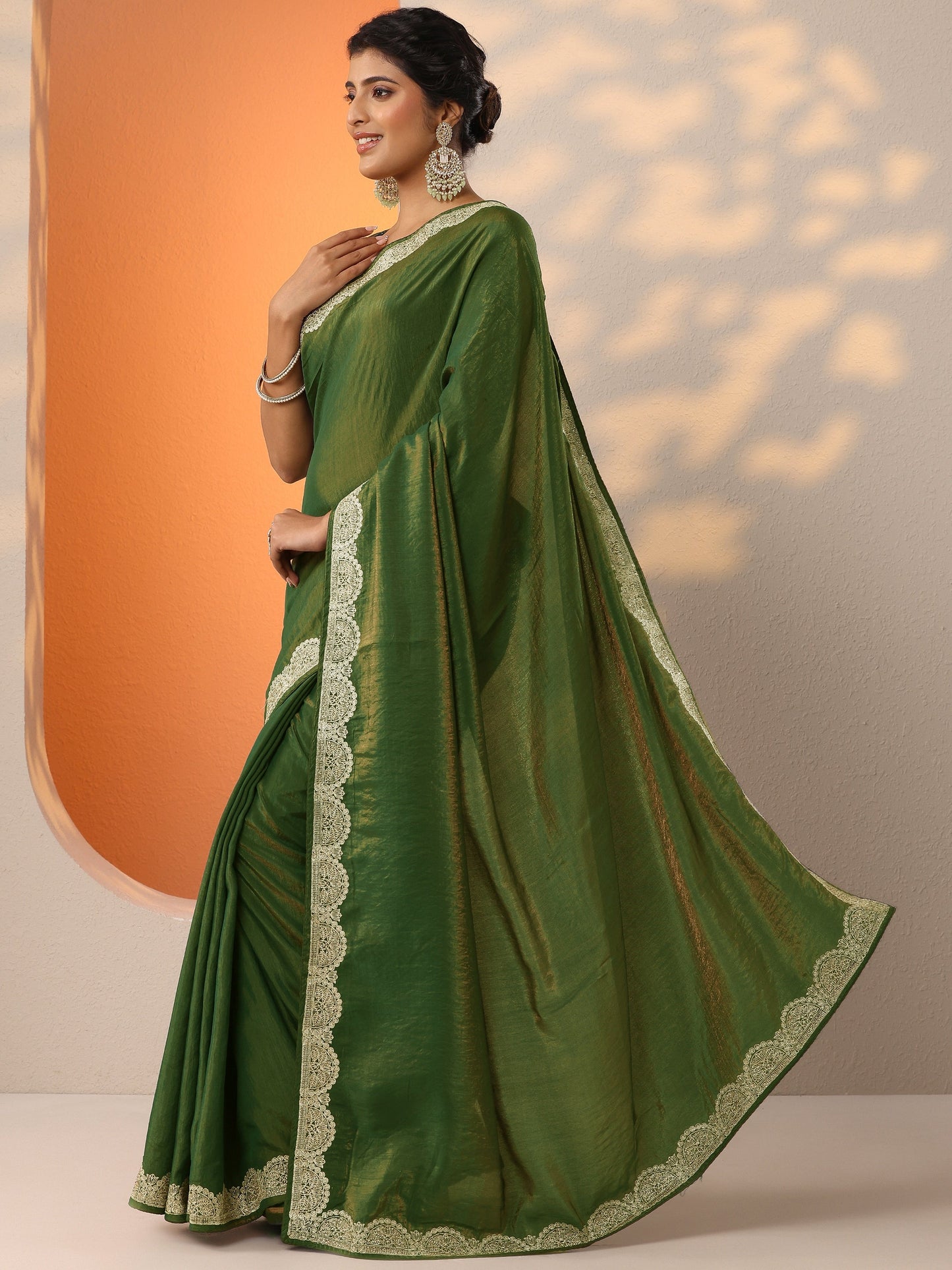Green Solid Organza Saree With Unstitched Blouse Piece