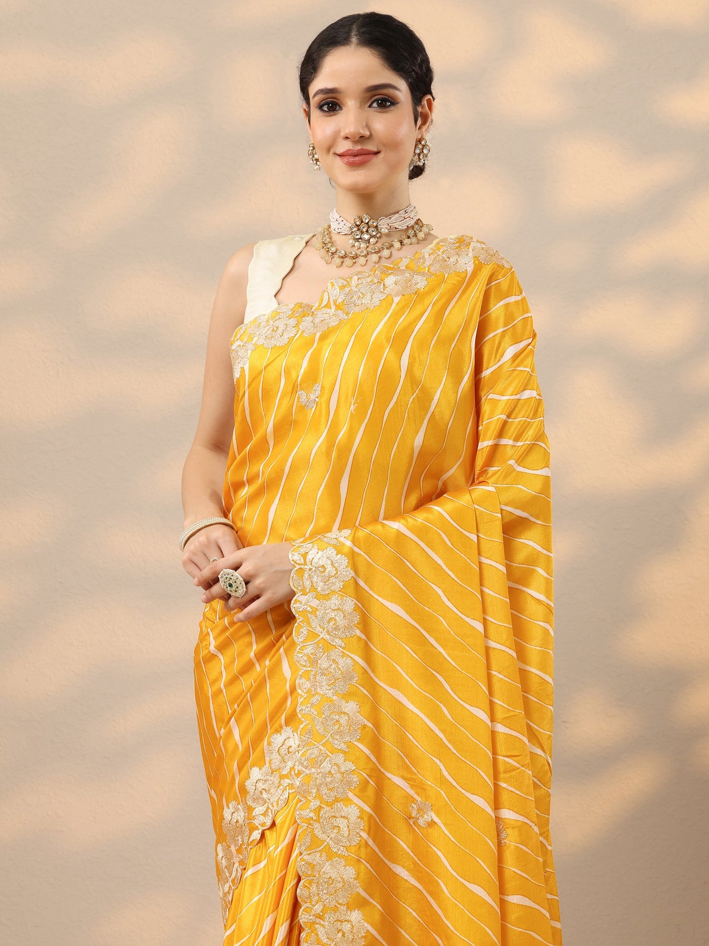 Mustard Leheriya Printed Chinon Saree With Unstitched Blouse Piece