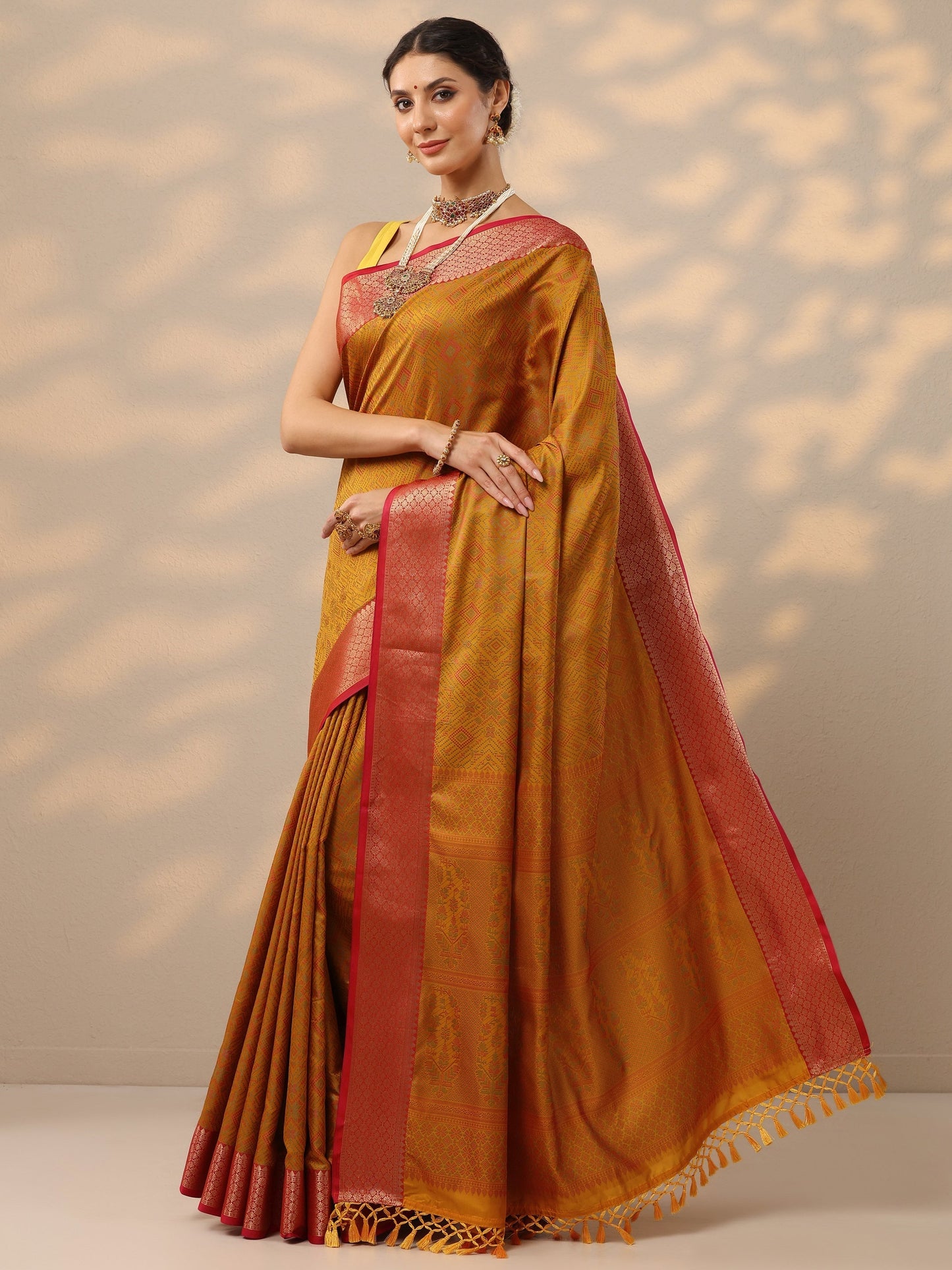 Mustard Woven Design Banarasi Silk Blend Saree With Unstitched Blouse Piece