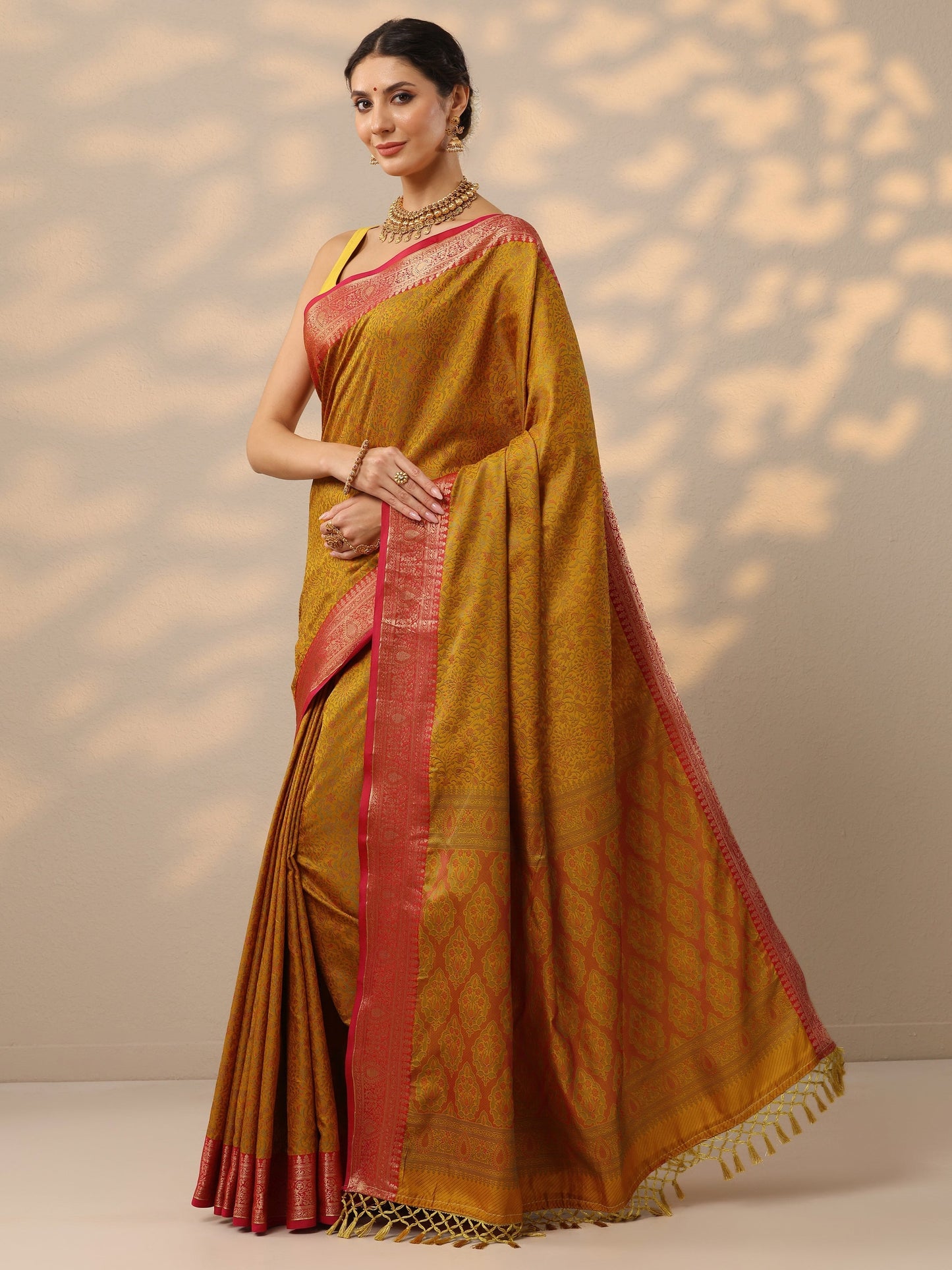 Mustard Woven Design Banarasi Silk Blend Saree With Unstitched Blouse Piece
