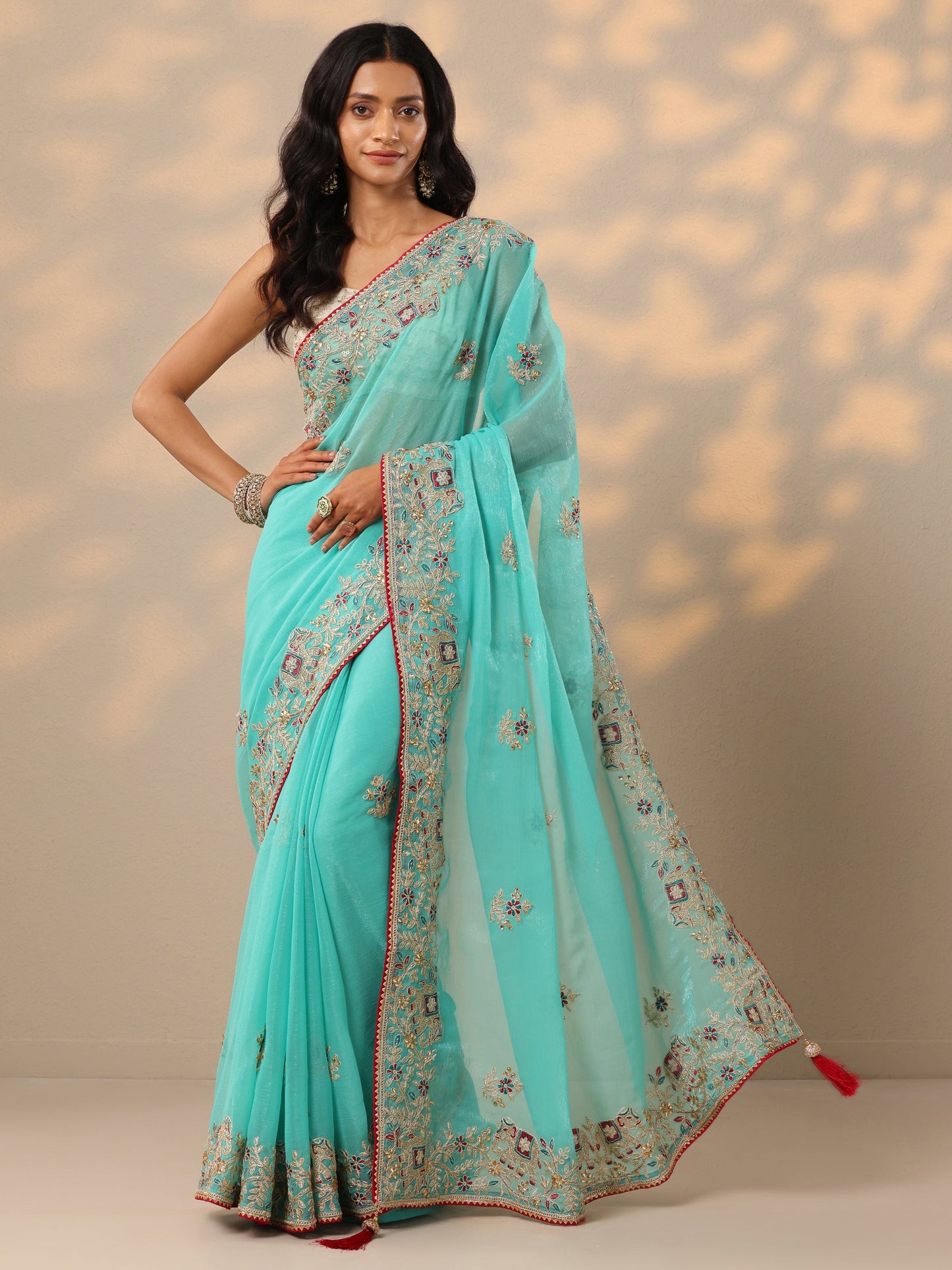 Turquoise Blue Embroidered Chinon Saree With Unstitched Blouse Piece