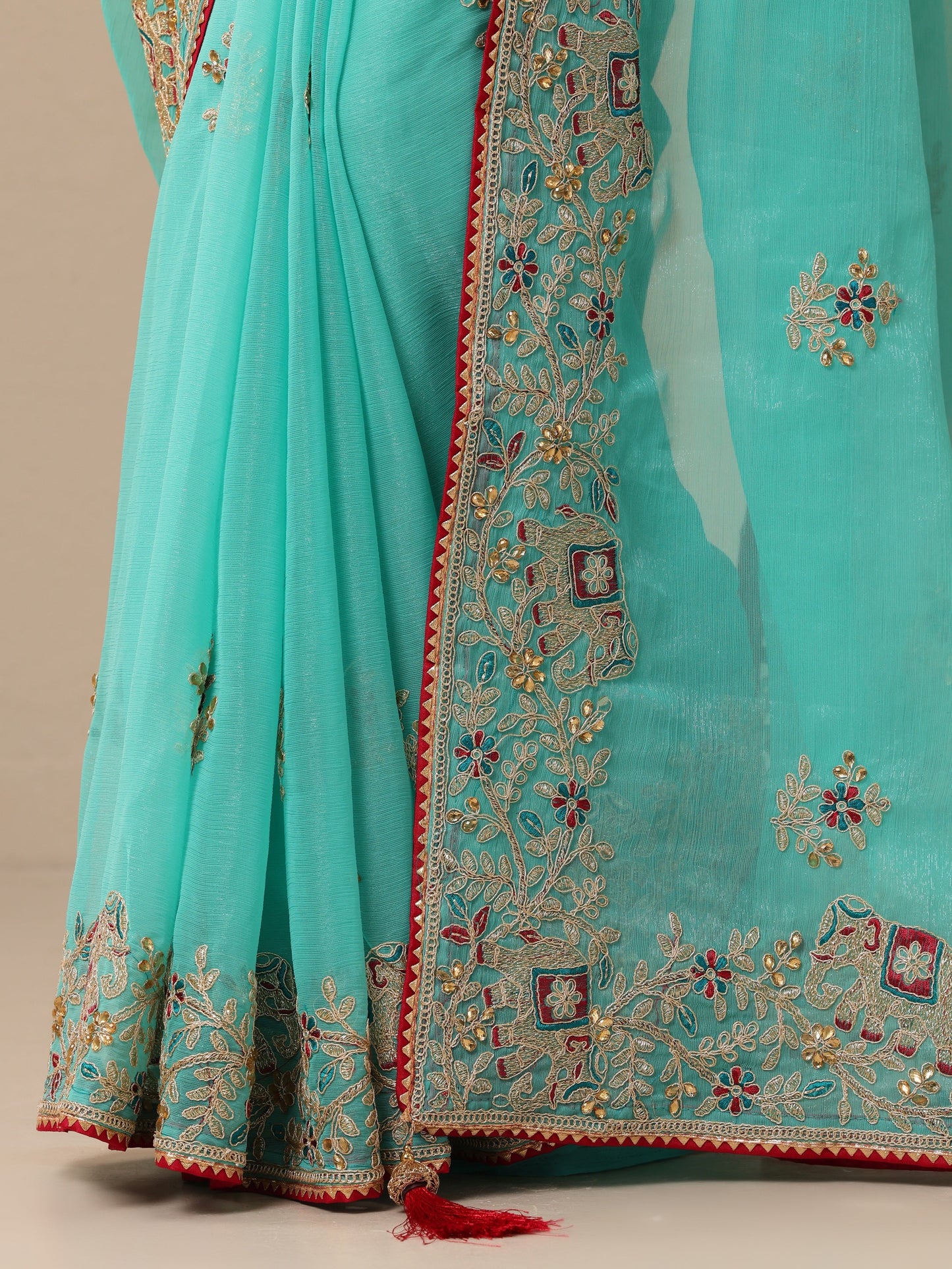 Turquoise Blue Embroidered Chinon Saree With Unstitched Blouse Piece