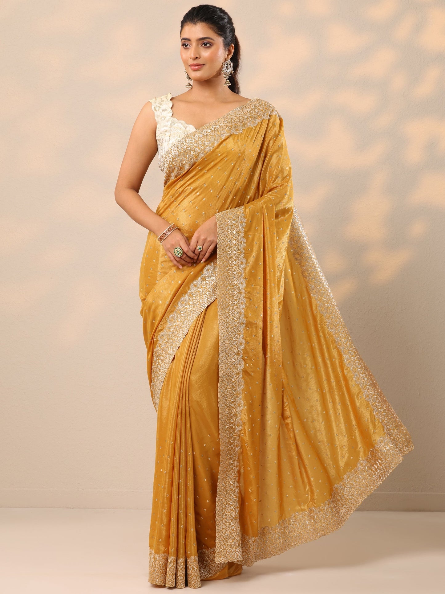 Mustard Embellished Crepe Sarees With Unstitched Blouse Piece