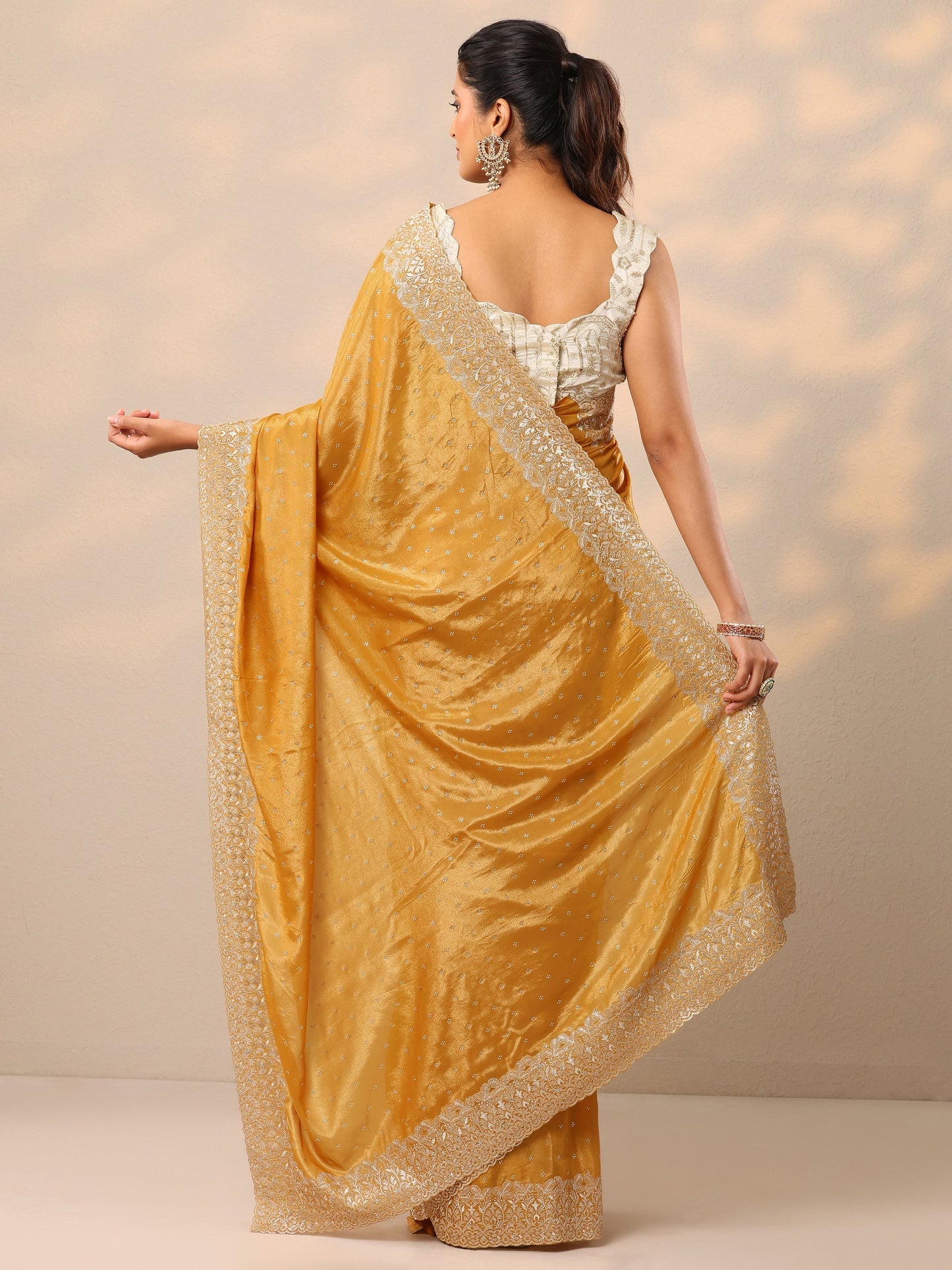 Mustard Embellished Crepe Sarees With Unstitched Blouse Piece
