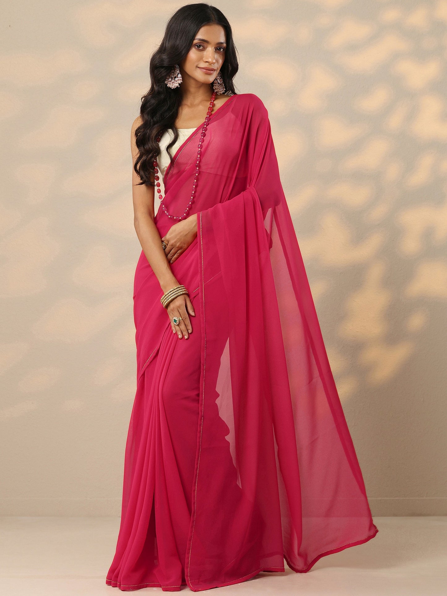 Pink Solid Georgette Saree With Unstitched Blouse Piece