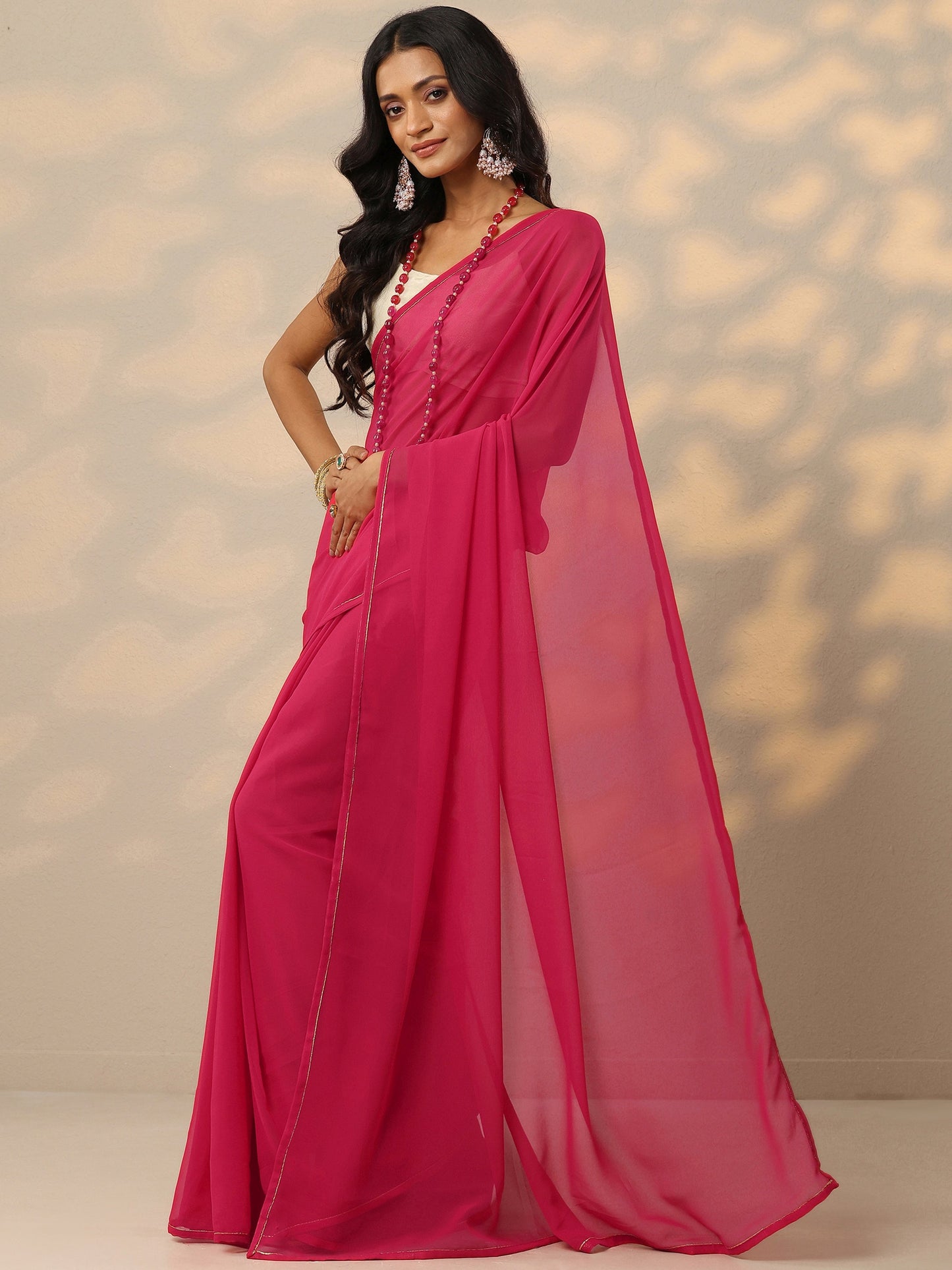 Pink Solid Georgette Saree With Unstitched Blouse Piece