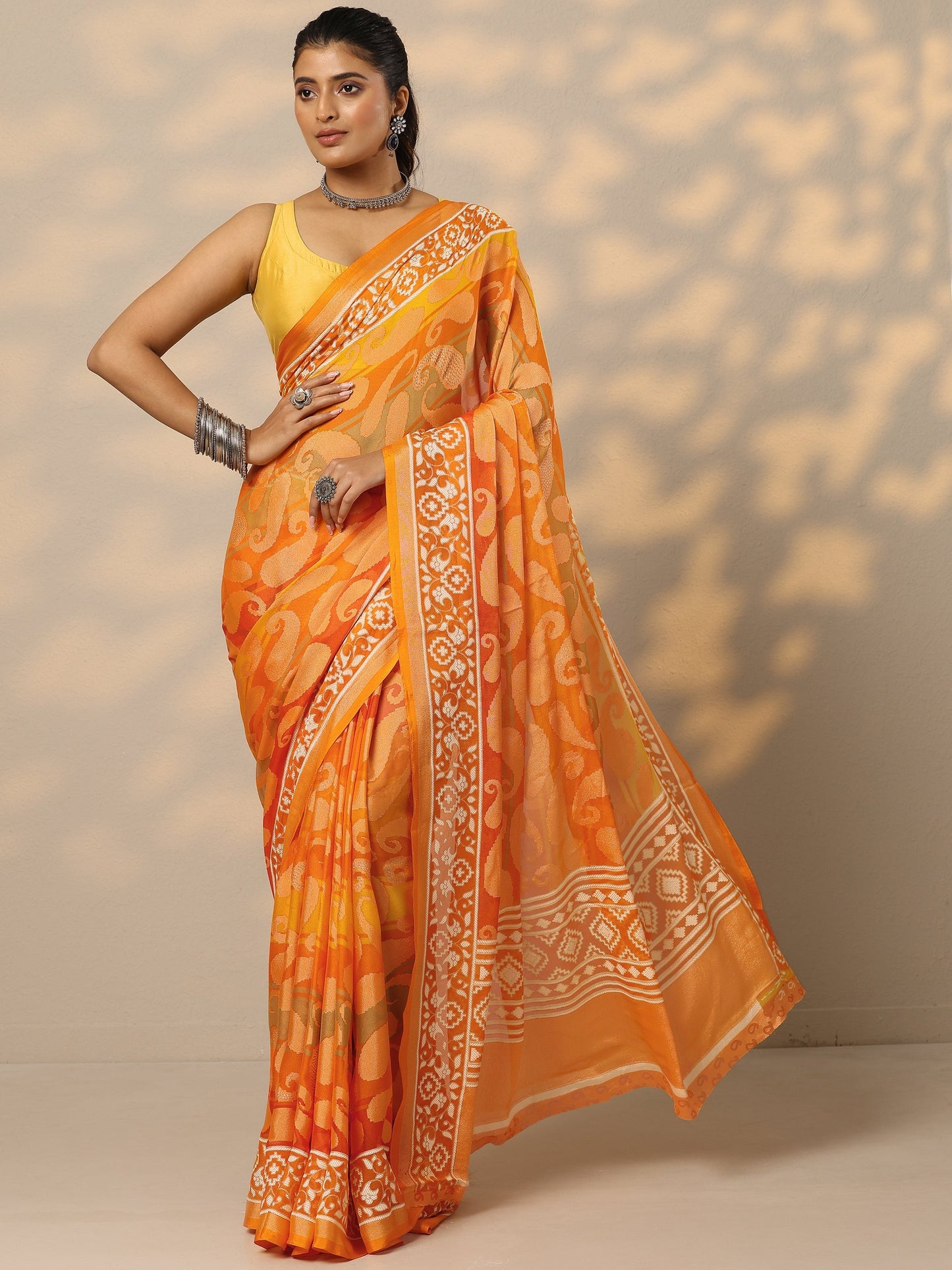 Mustard Printed Georgette Saree With Unstitched Blouse Piece