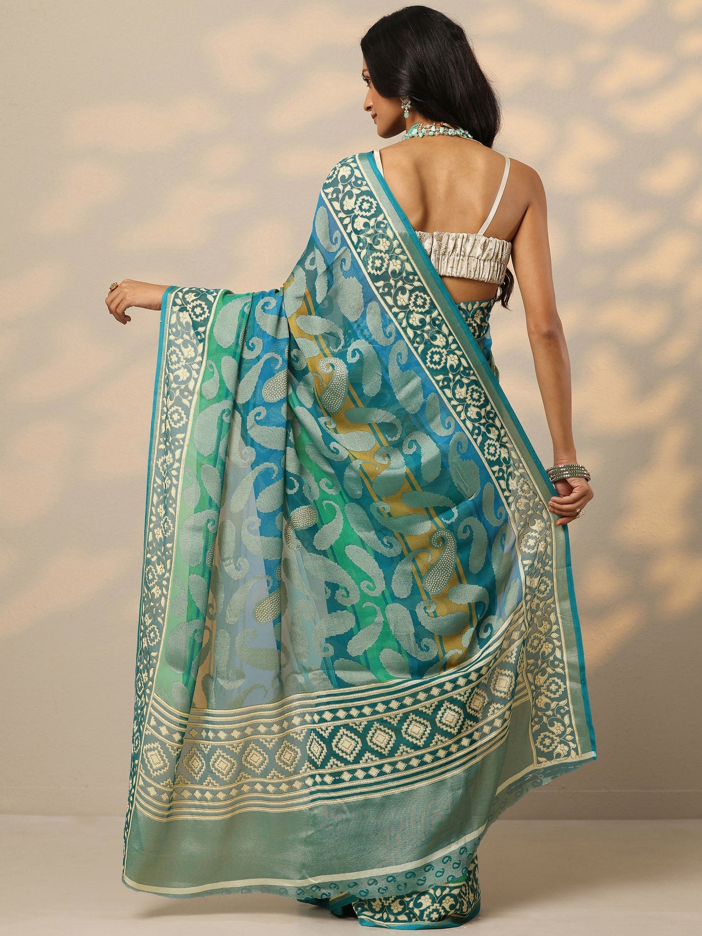 Teal Printed Georgette Saree With Unstitched Blouse Piece