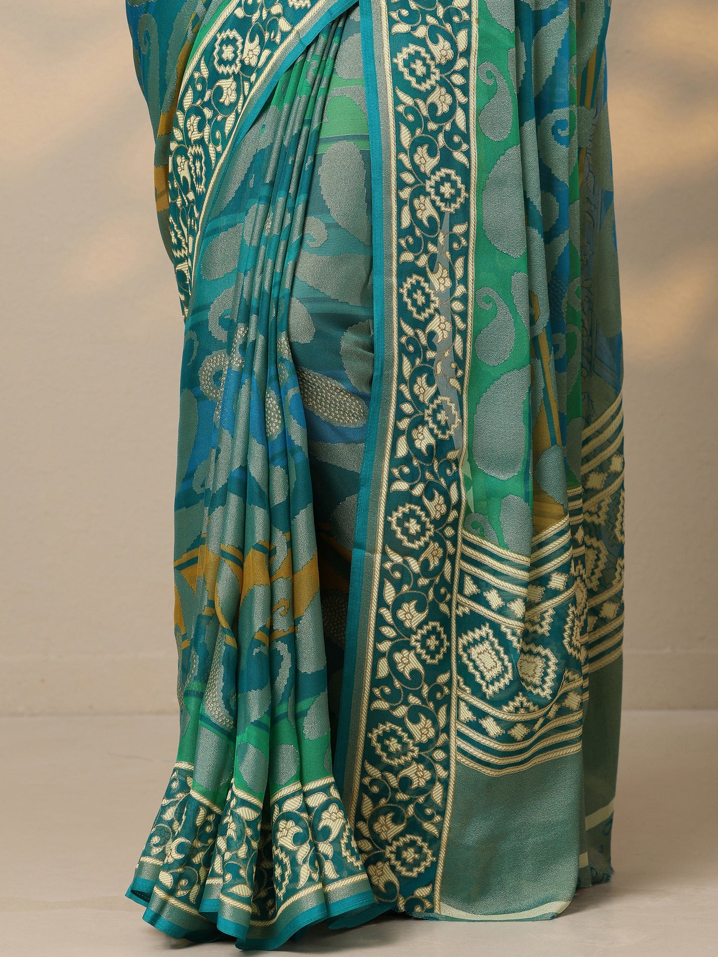 Teal Printed Georgette Saree With Unstitched Blouse Piece
