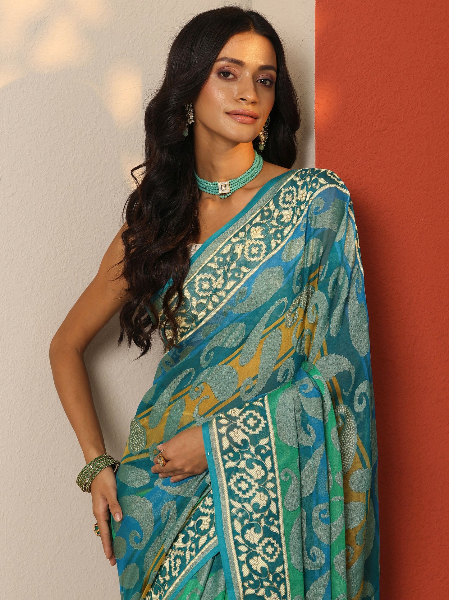 Teal Printed Georgette Saree With Unstitched Blouse Piece
