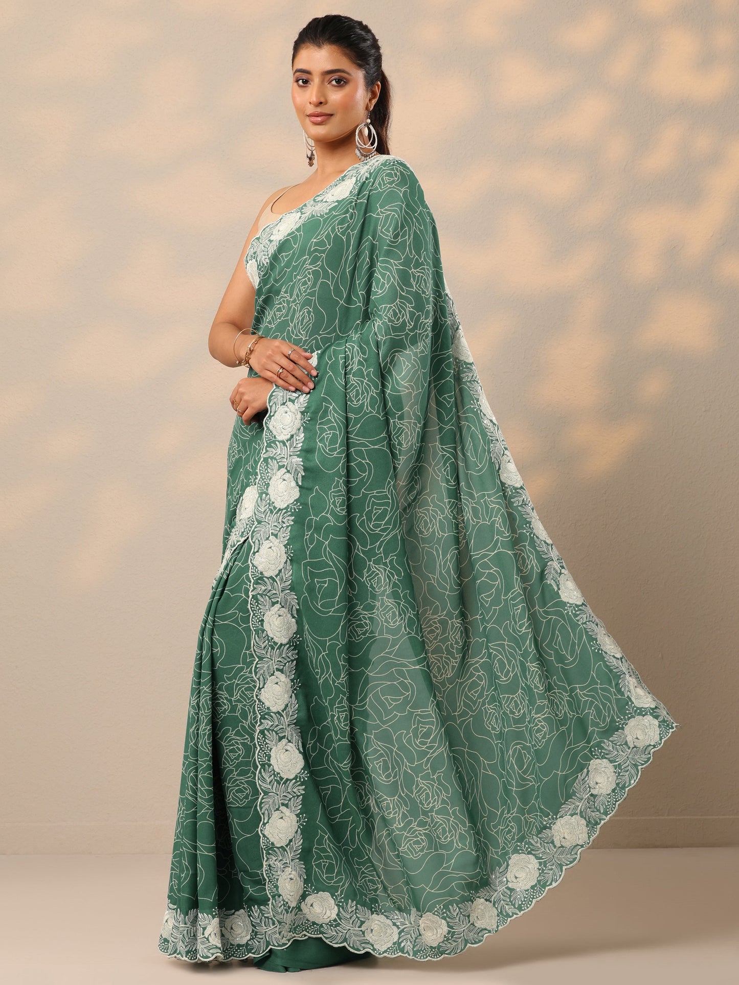 Turquoise blue Printed Georgette Sarees With Unstitched Blouse Piece