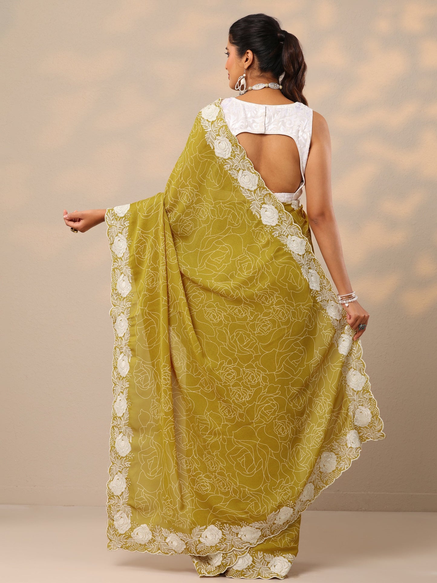 Mustard Printed Georgette Sarees With Unstitched Blouse Piece