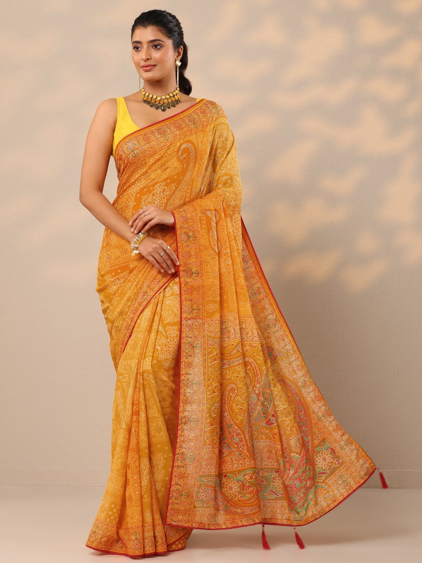 Yellow Printed Georgette Sarees With Unstitched Blouse Piece