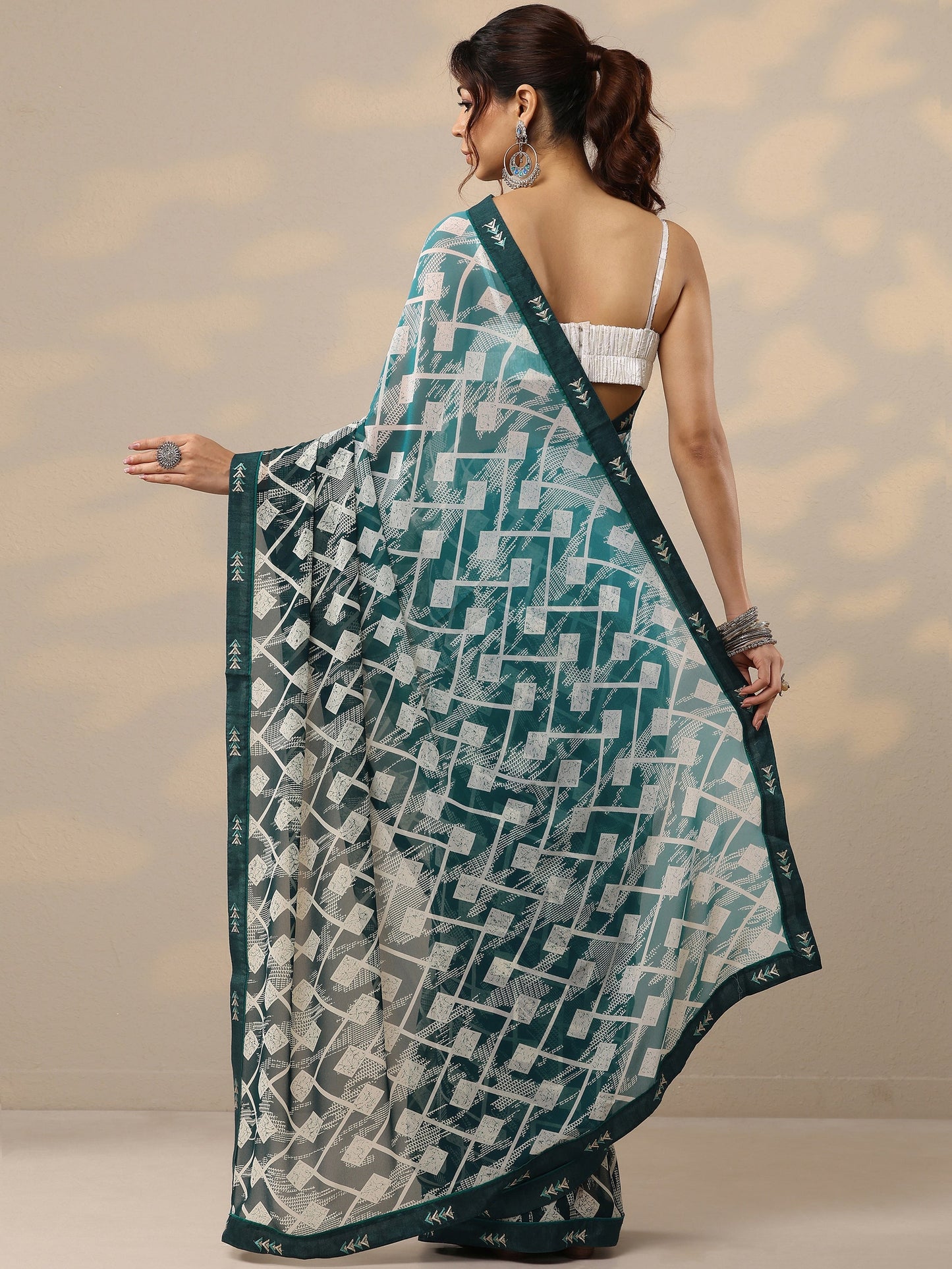 Teal Printed Georgette Sarees With Unstitched Blouse Piece