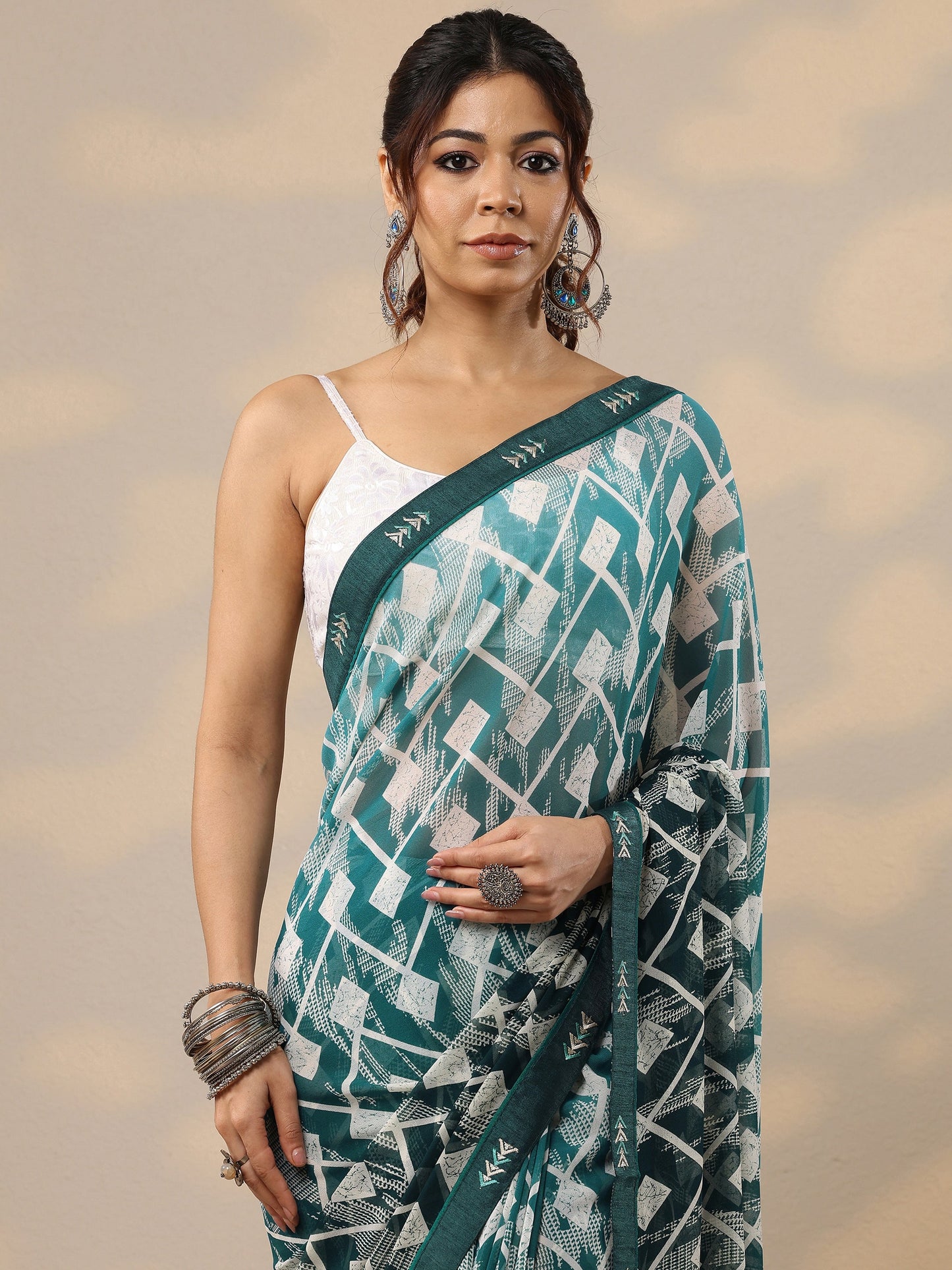 Teal Printed Georgette Sarees With Unstitched Blouse Piece
