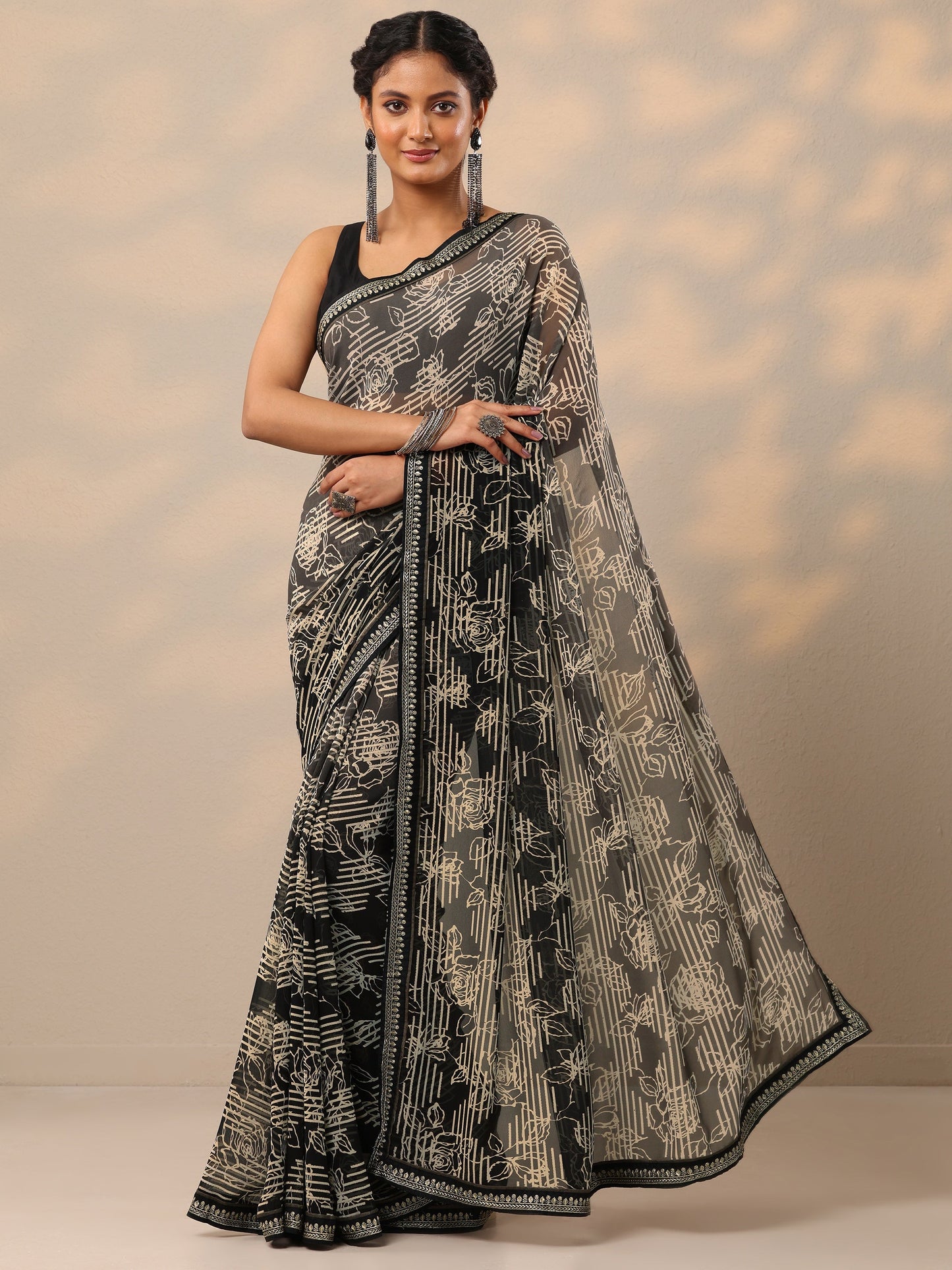 Black Printed Georgette Saree With Unstitched Blouse Piece