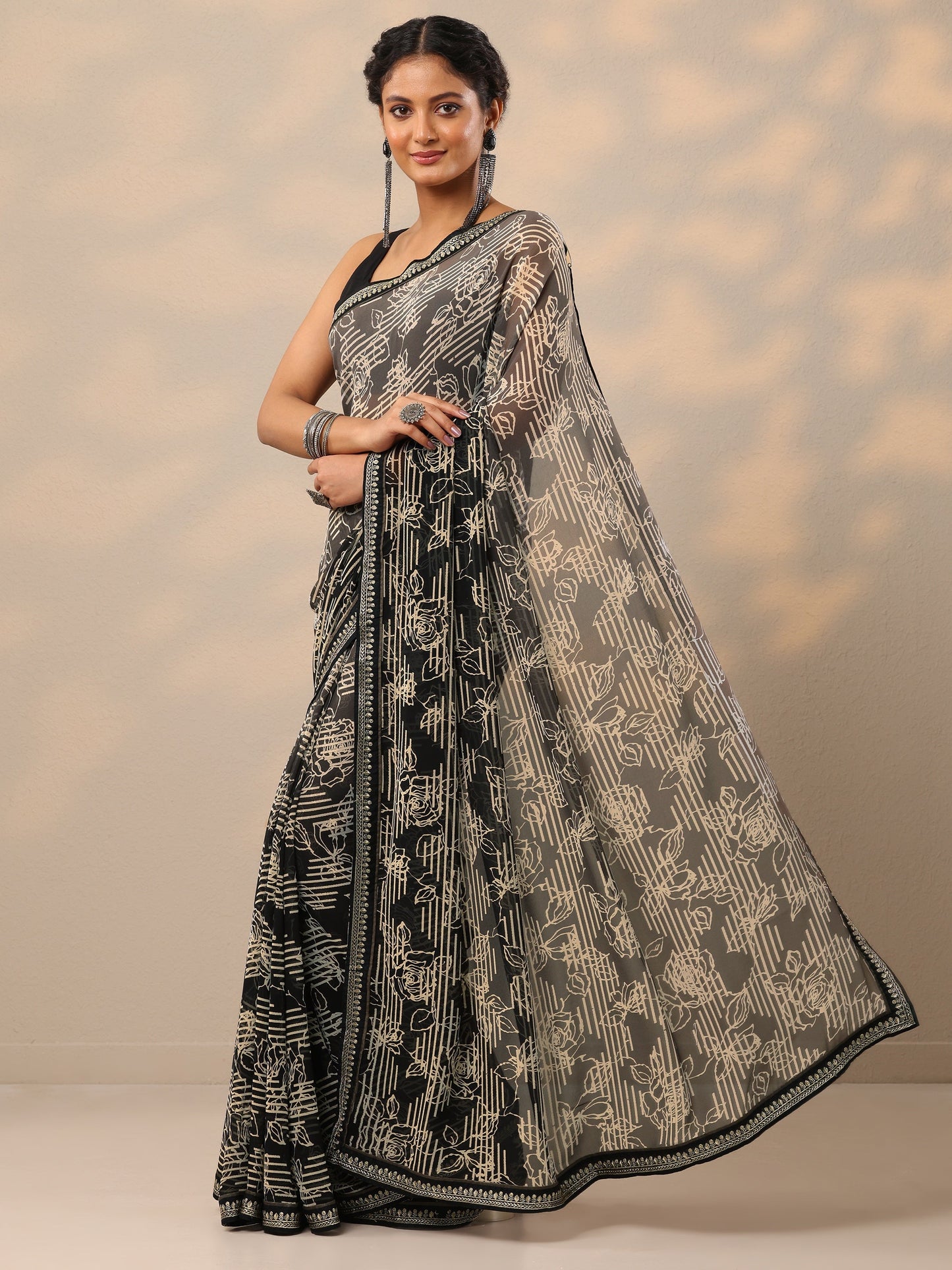Black Printed Georgette Saree With Unstitched Blouse Piece