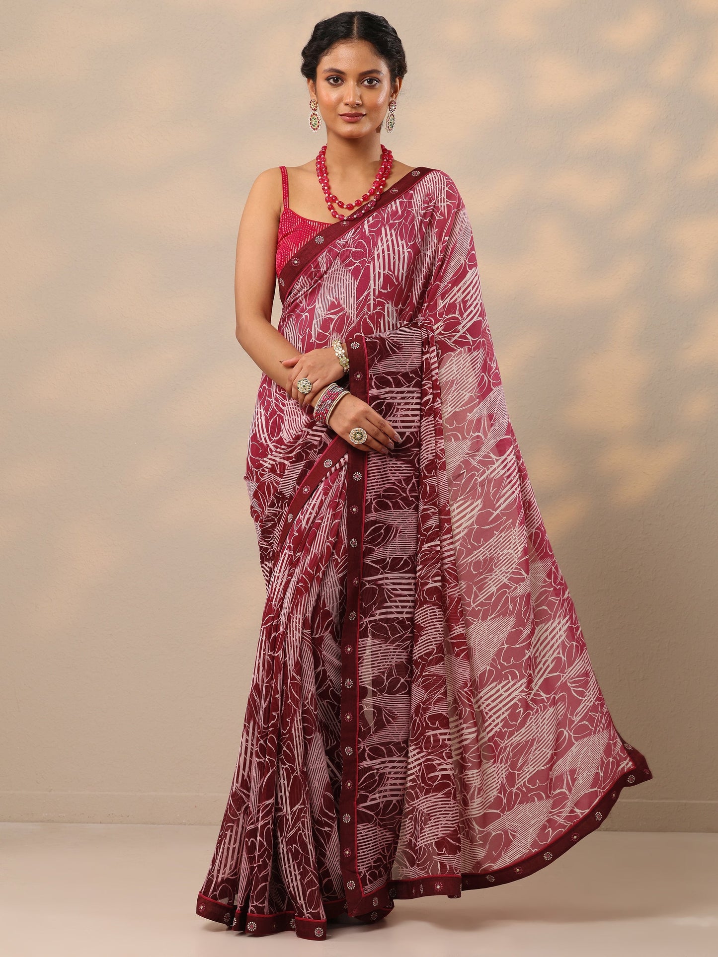 Maroon Printed Georgette Saree With Unstitched Blouse Piece