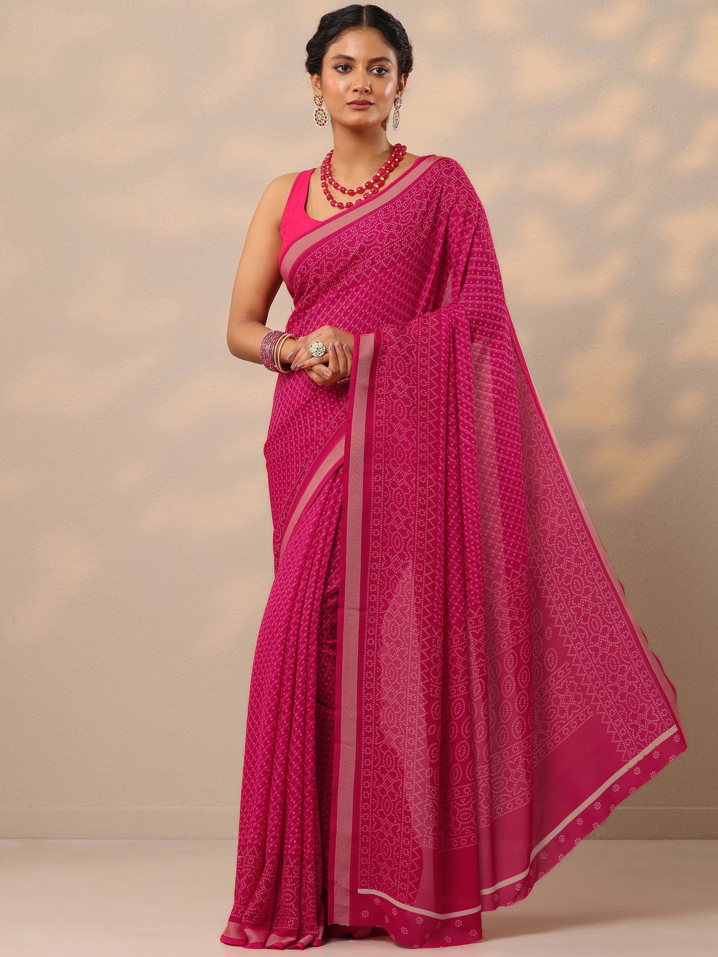 Pink Bandhani Printed Georgette Saree With Unstitched Blouse Piece