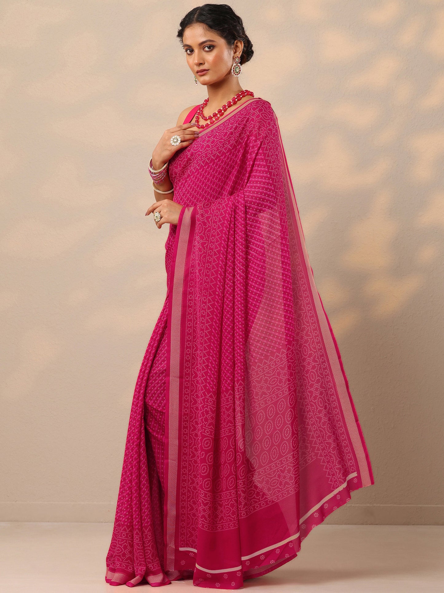 Pink Bandhani Printed Georgette Saree With Unstitched Blouse Piece