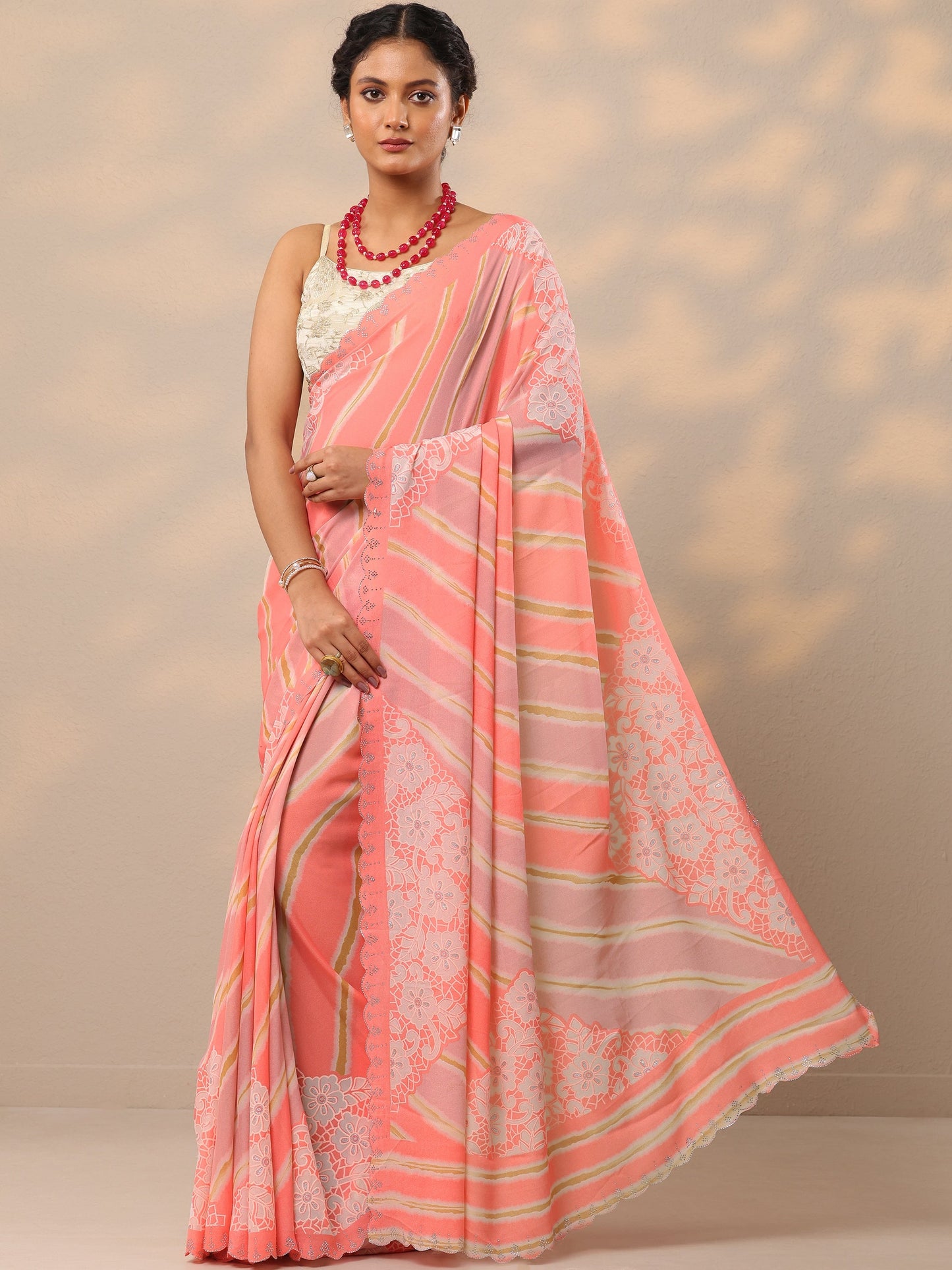 Coral Leheriya Printed Georgette Saree With Unstitched Blouse Piece
