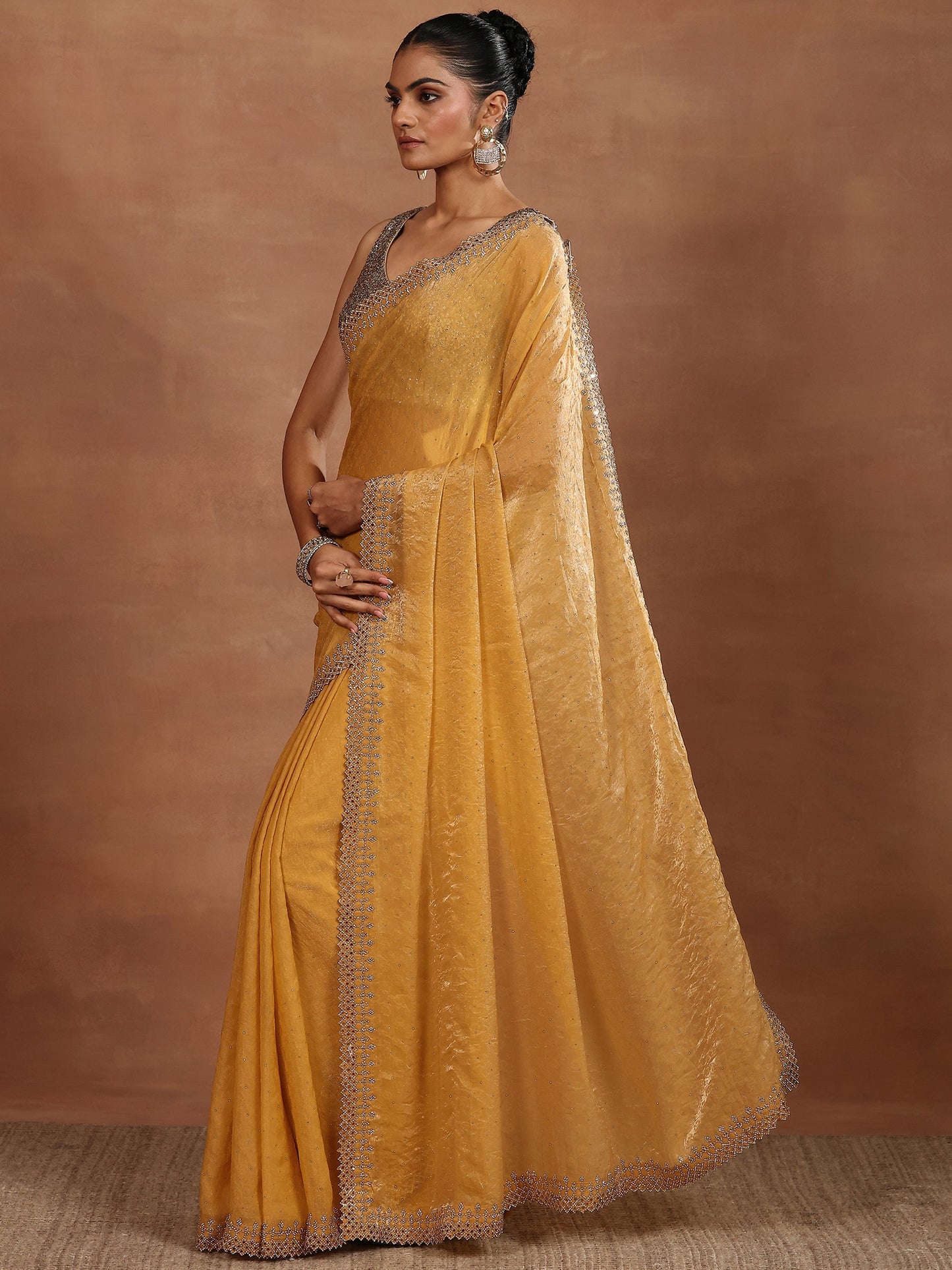 Mustard Embellished Chiffon Sarees With Unstitched Blouse Piece