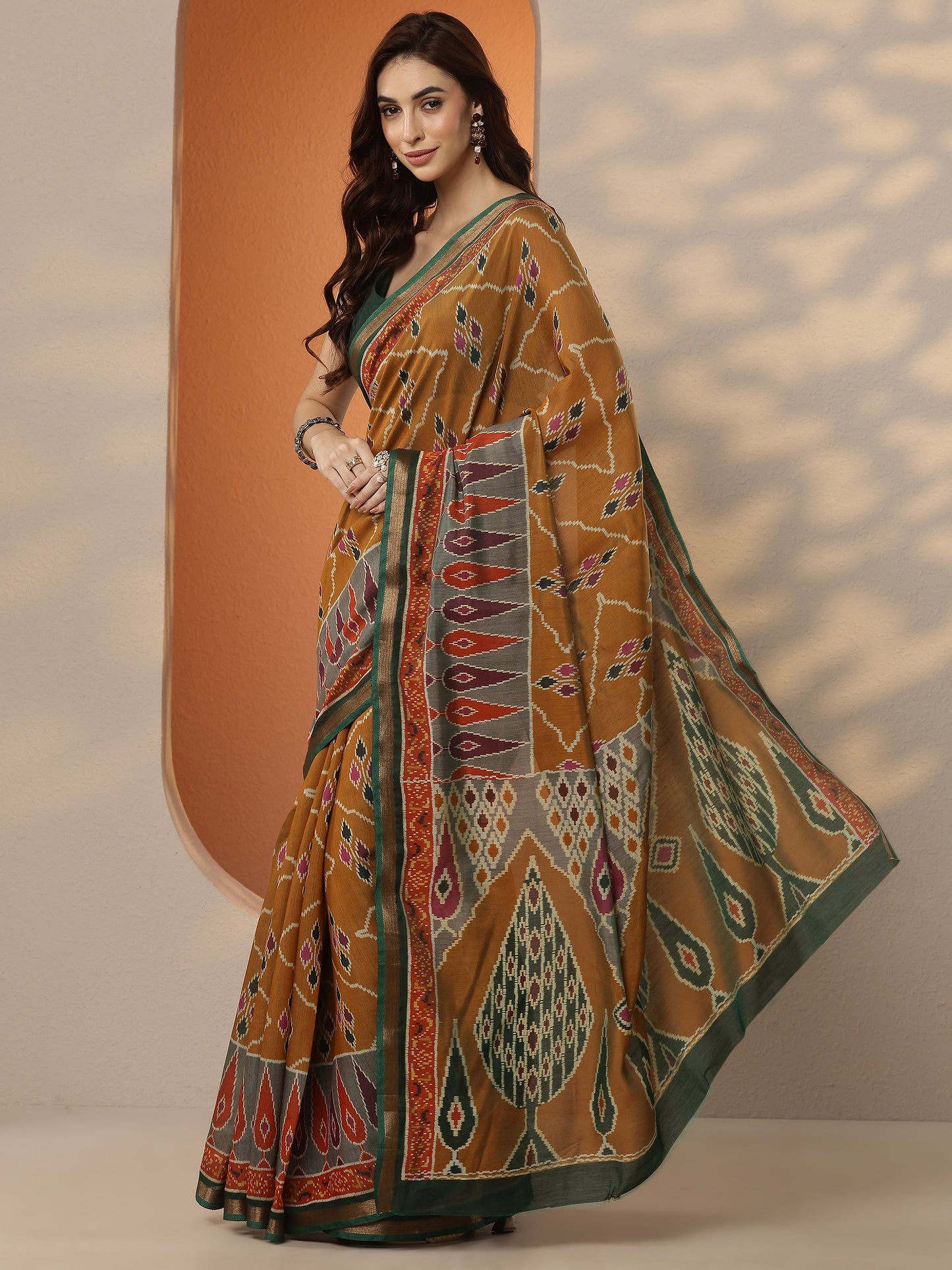 Mustard Ikkat Printed Silk Blend Saree With Unstitched Blouse Piece