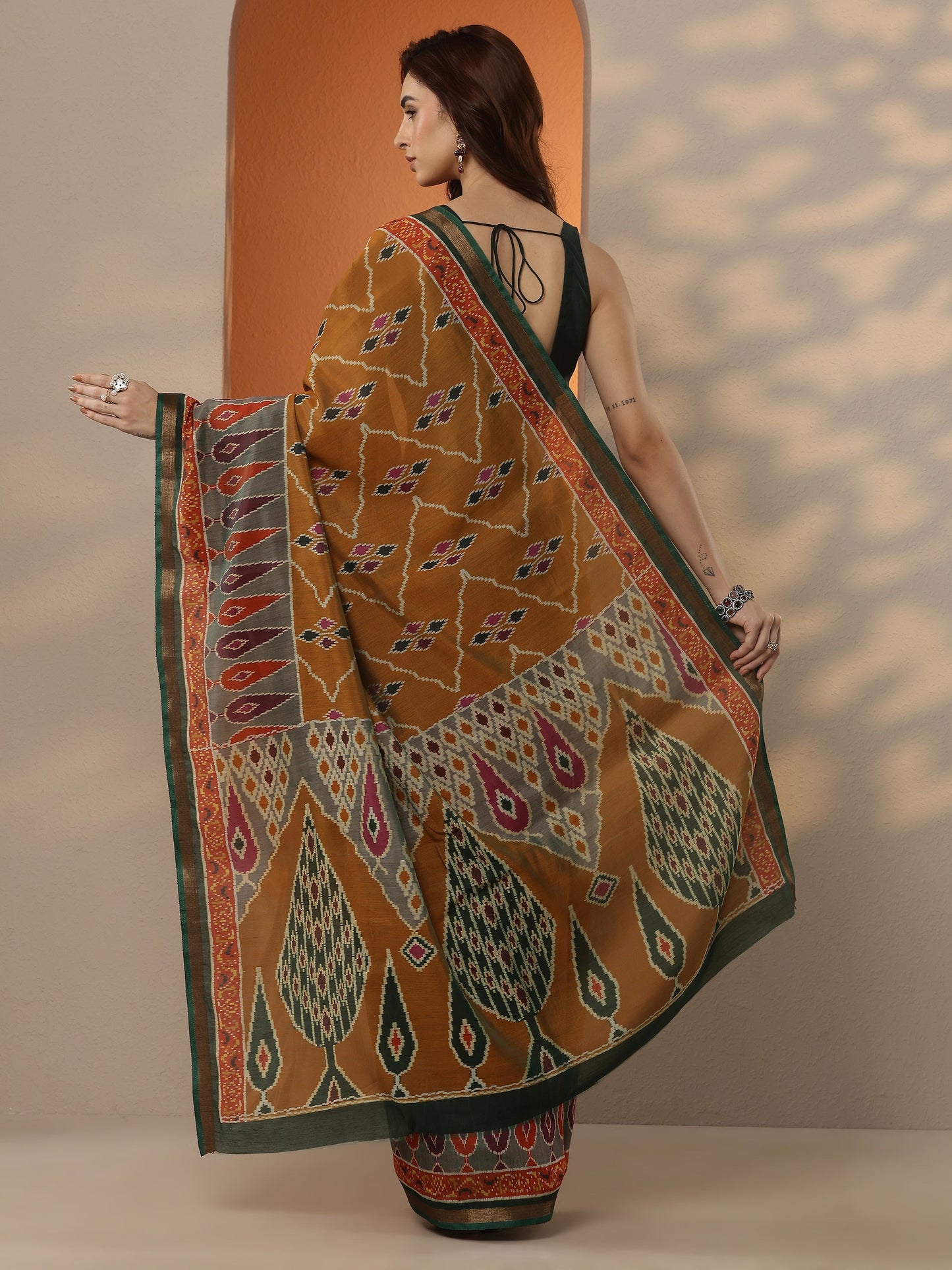 Mustard Ikkat Printed Silk Blend Saree With Unstitched Blouse Piece