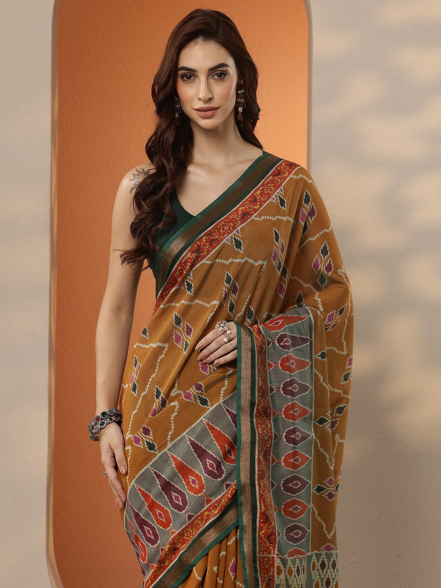 Mustard Ikkat Printed Silk Blend Saree With Unstitched Blouse Piece