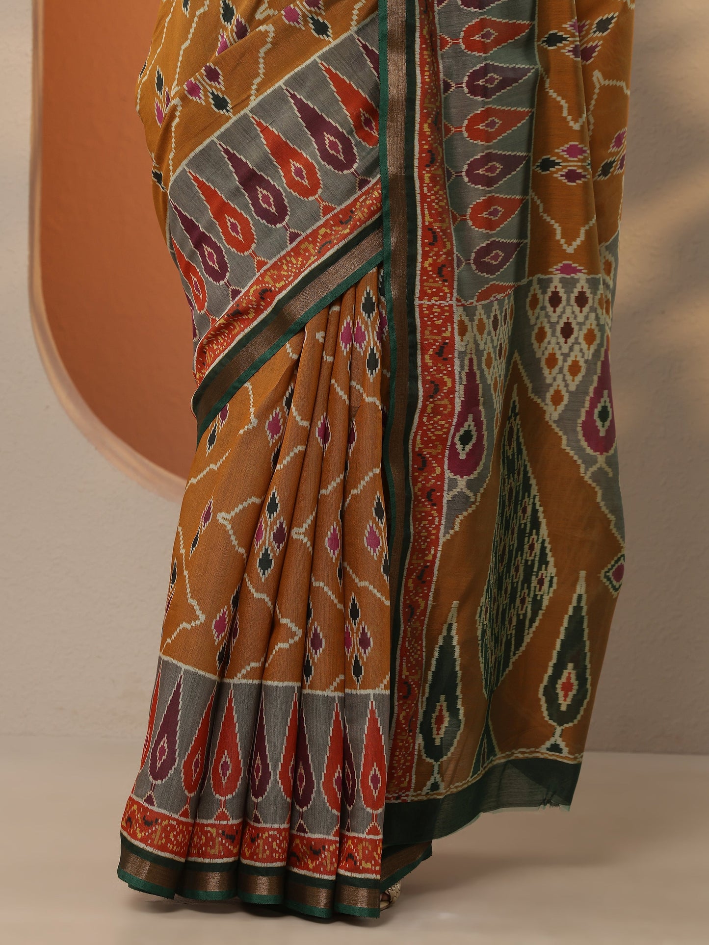 Mustard Ikkat Printed Silk Blend Saree With Unstitched Blouse Piece