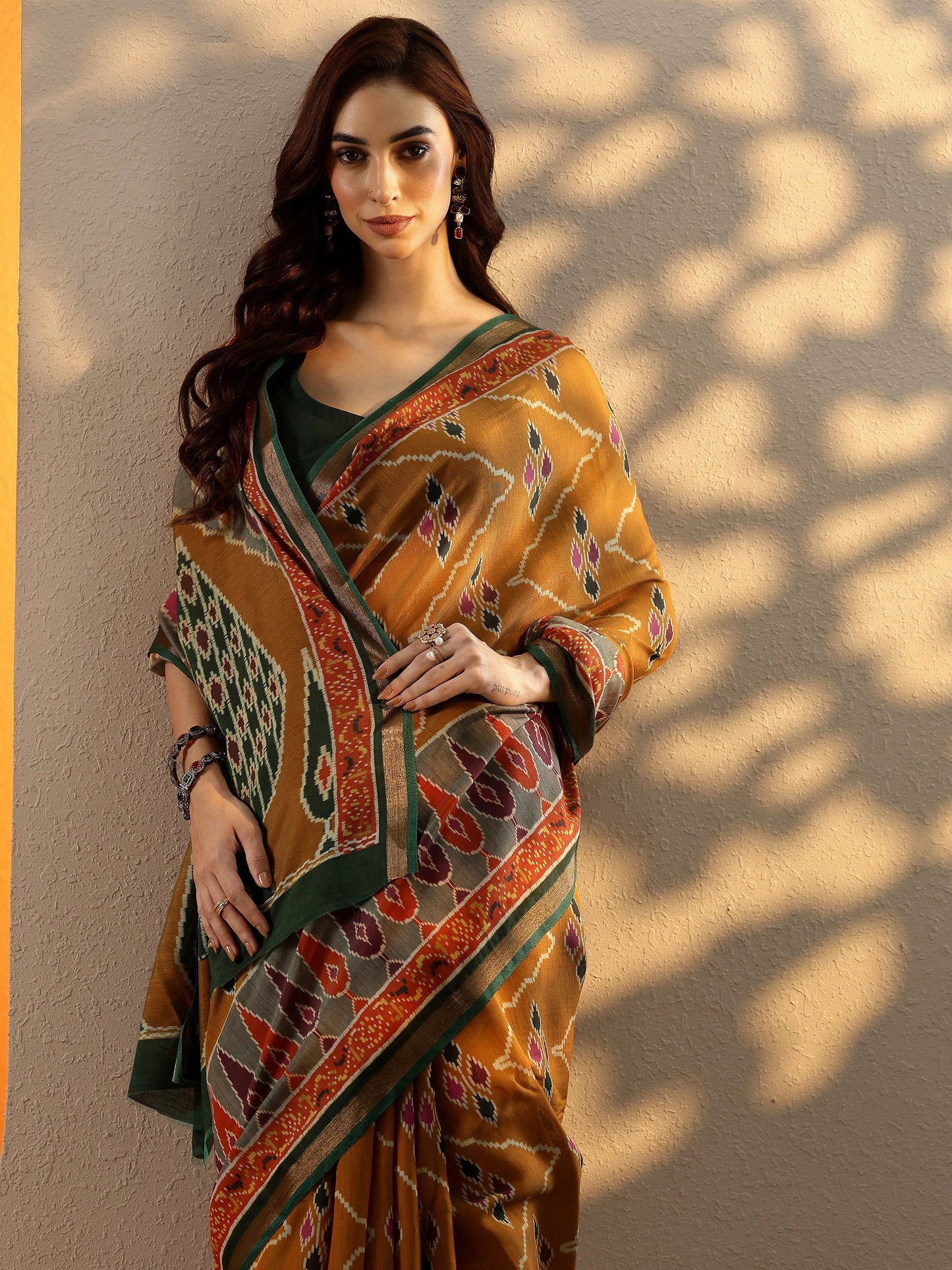 Mustard Ikkat Printed Silk Blend Saree With Unstitched Blouse Piece